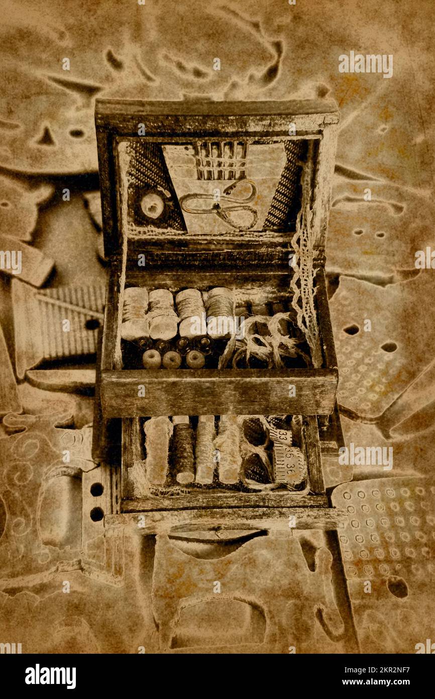 Antique colonial era artwork on a box of sewing tools from bygone