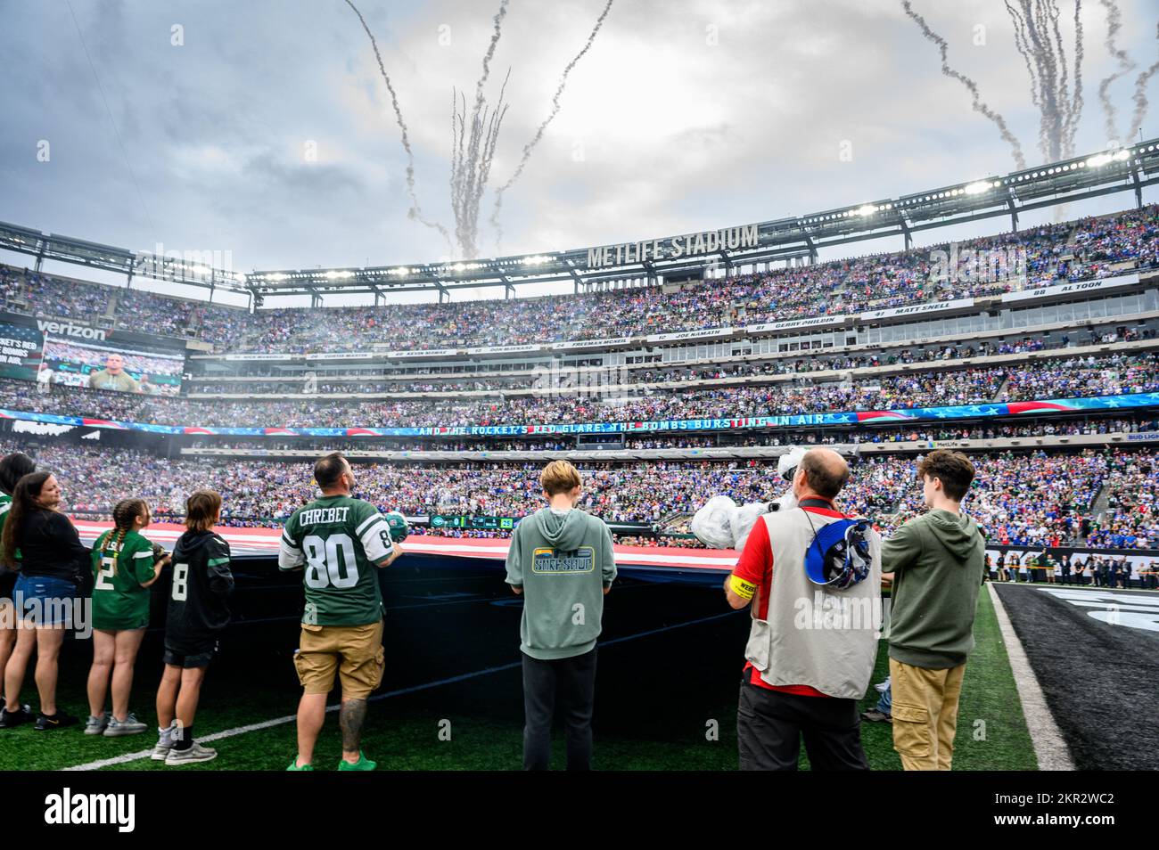 New Jersey National Guard Soldiers hold the American Flag along