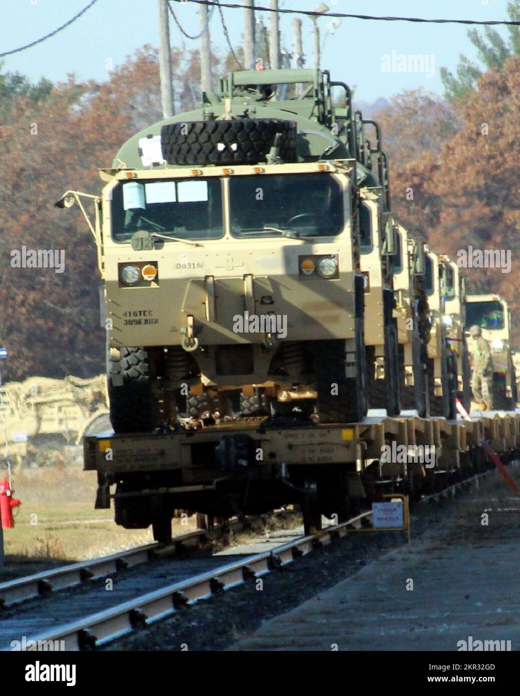 Railcars that were loaded by Soldiers with the Army Reserve’s 411th Engineer Company with military vehicles and equipment are shown Nov. 1, 2022, at Fort McCoy, Wis. Overall the company loaded 128 items on to railcars over the multi-day rail movement at the installation to deploy the equipment eventually to the U.S. Central Command area of responsibility. Five personnel with the Fort McCoy Logistics Readiness Center (LRC) assisted with the rail movement and its coordination. The 411th is the latest of many units over the last decade to hold rail movements at Fort McCoy. As a matter of fact, fo Stock Photo
