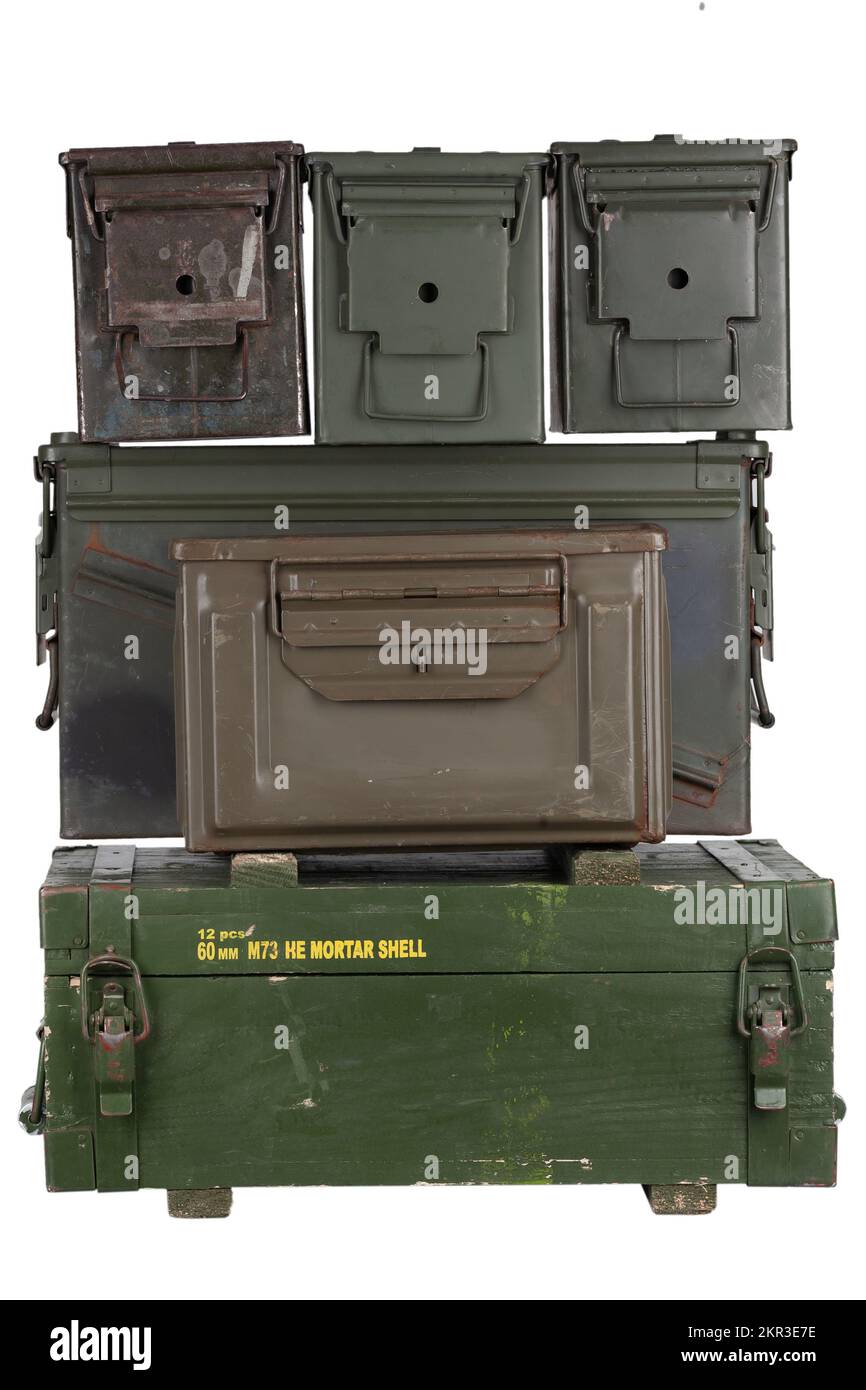 Stack of US army ammo cans and army green crate isolated on white background Stock Photo