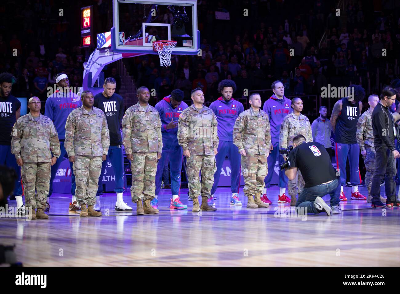 DETROIT, Mich. - Soldiers stand at the position of attention for the national anthem during the Detroit Pistons military appreciation event at Little Caesars Arena on Nov. 7, 2022. (Army Reserve photo by Isaac Copeland, 220th Public Affairs Detachment).    The Detroit Pistons honor the service of our veterans at the Military Appreciation (Hoops for Troops) game in honor of Veterans Day. Veterans Day is a way to say thank you to all those who have served with the highest appreciation. Those who have risked their lives making sacrifices for their country and families. The expression of gratitude Stock Photo