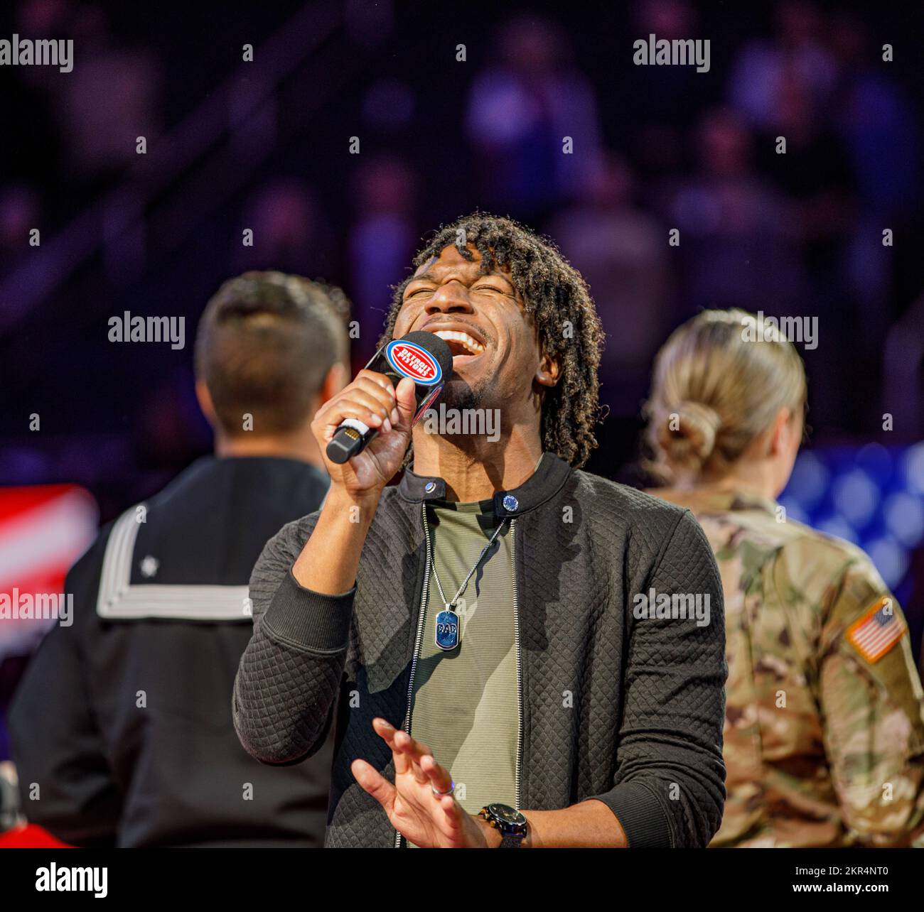 DETROIT, Mich. - Le’Bron Brinkley performs the National Anthem during the Detroit Pistons Military Appreciation Night event at Little Ceasars Arena on Nov. 7, 2022. (Army Reserve photo by Pfc. Joseph Honce, 220th Public Affairs Detachment).     The Detroit Pistons host their annual Military Appreciation Night in celebration of Veterans Day, in collaboration with members of the U.S. Armed Forces and their families on Monday, Nov. 7. This game was themed Hoops for Troops, a program that is a year-round initiative led by the NBA, its teams and players in collaboration with the Department of Defen Stock Photo