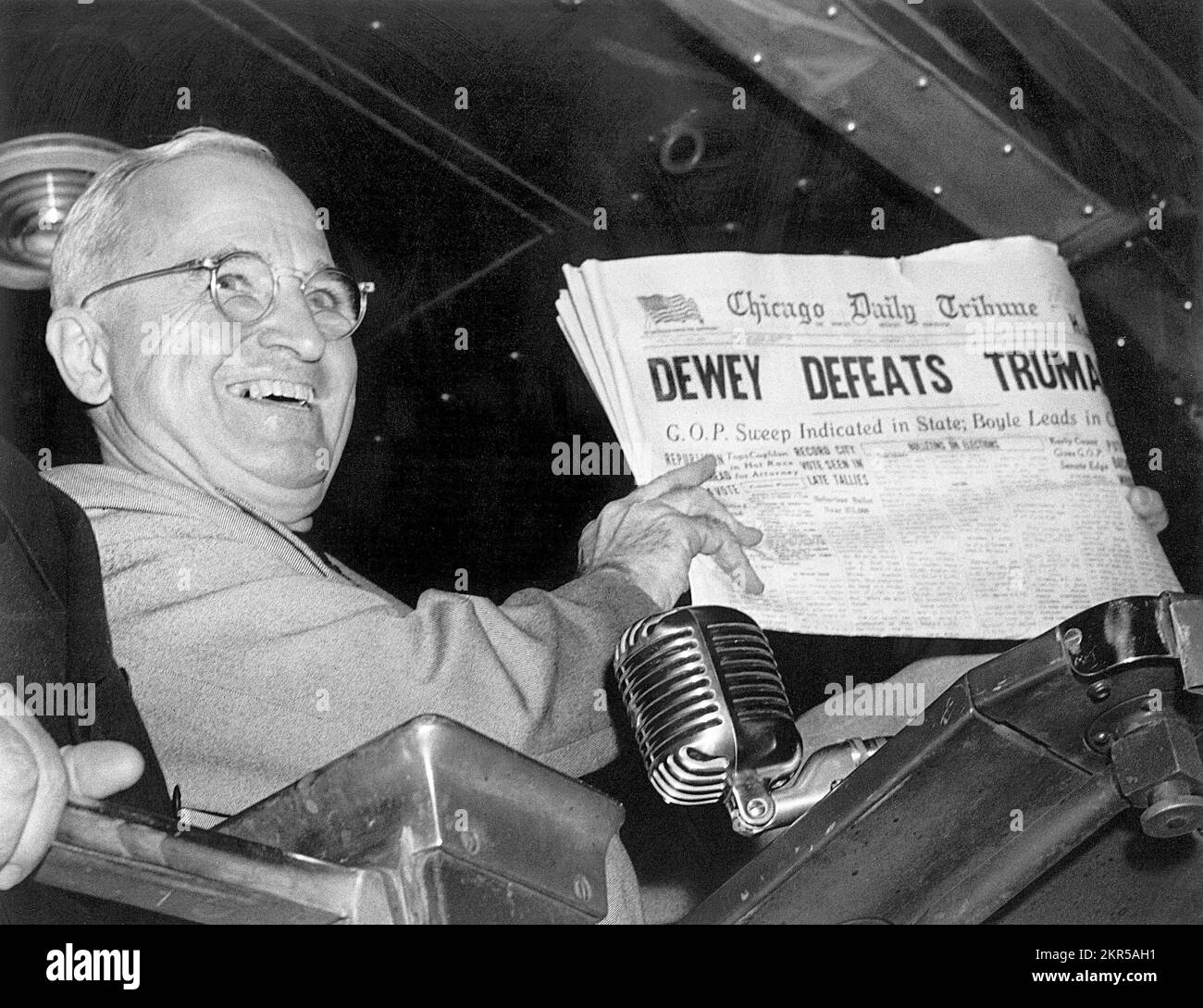President Harry S. Truman at St. Louis' Union Station holds up an election day edition of the Chicago Daily Tribune, which - based on early results - mistakenly announced 'Dewey Defeats Truman.' Stock Photo