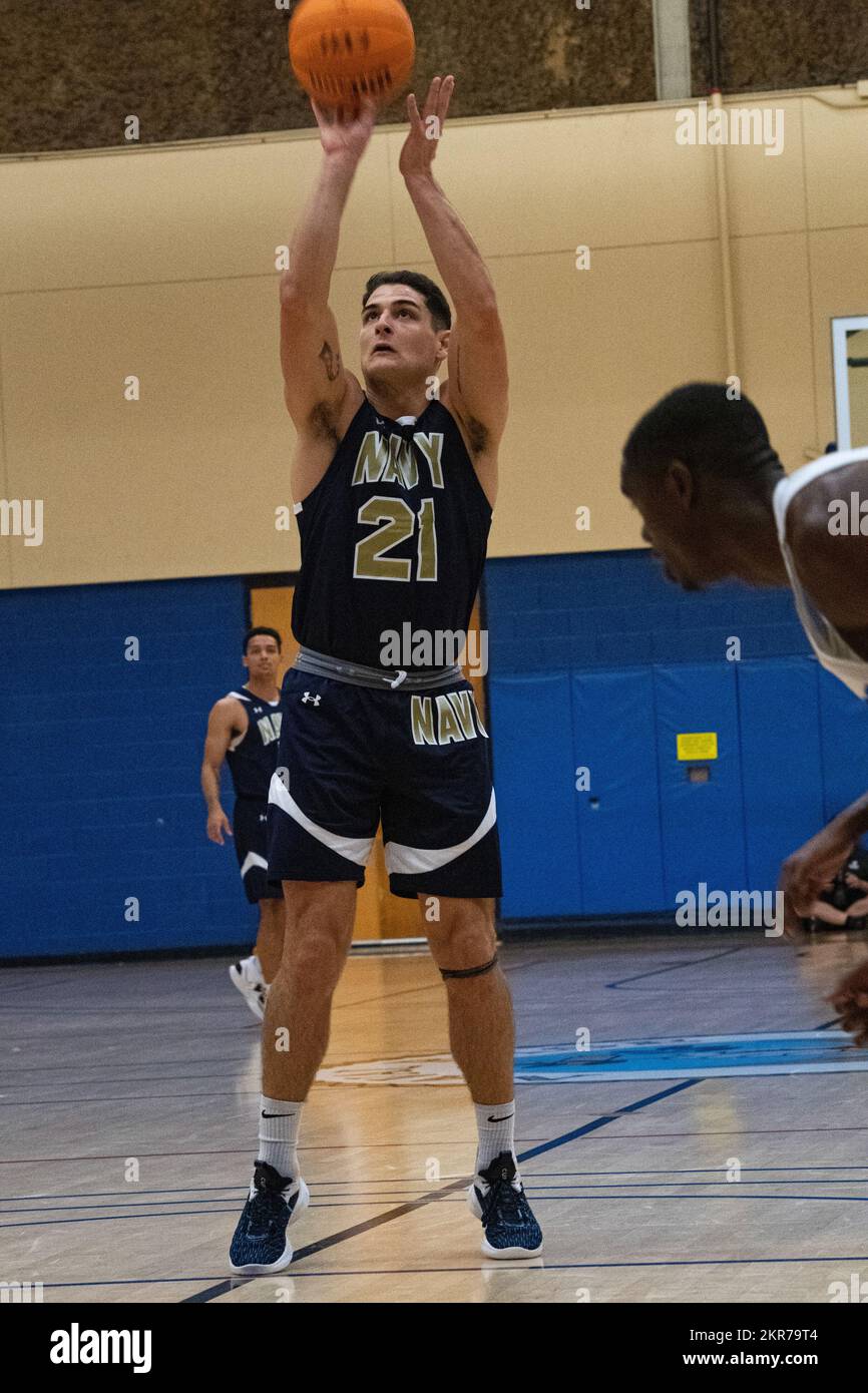 U.S. Navy Lt. Grant Vermeer, a member of team Navy, shoots a free throw