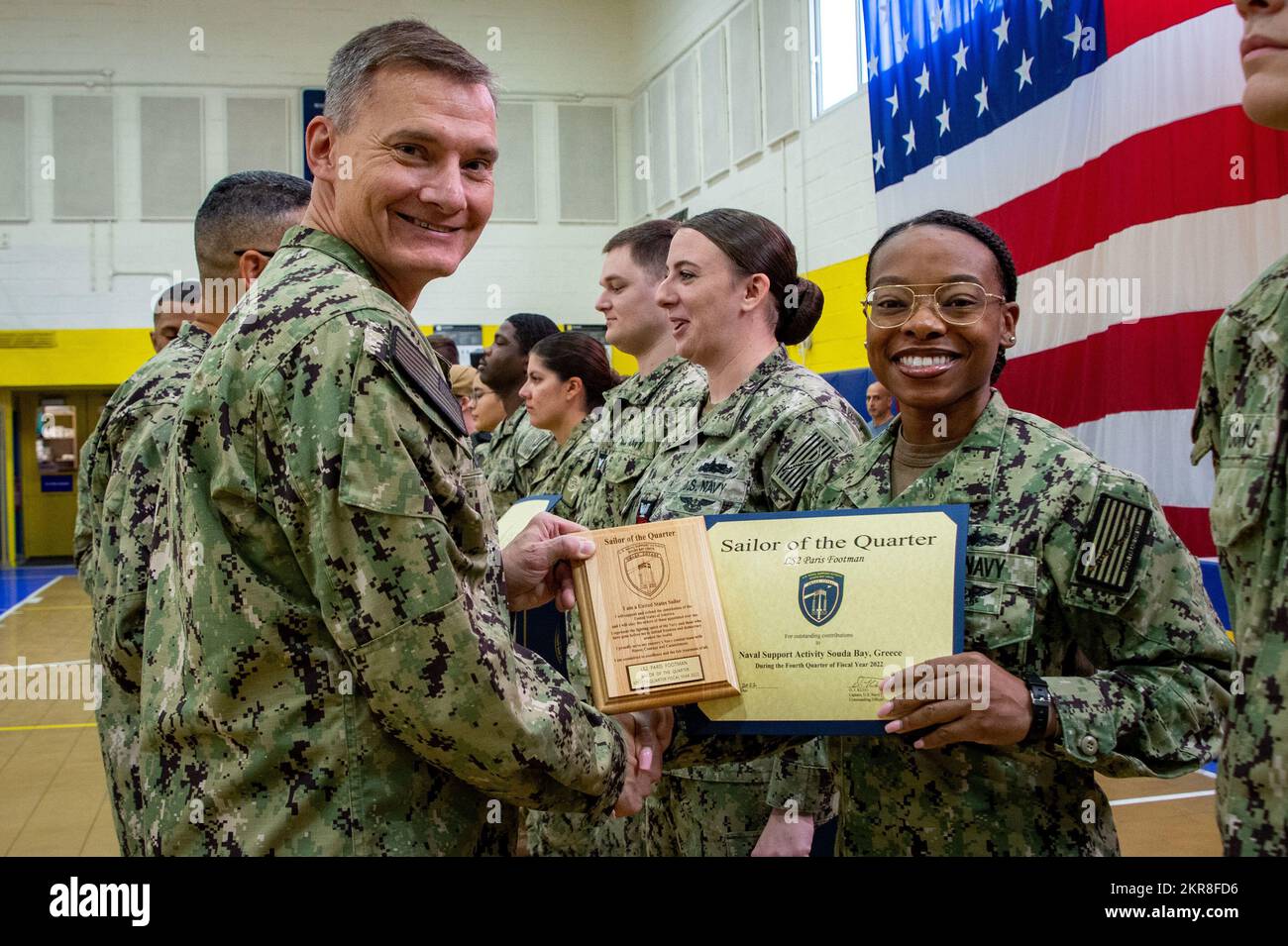 NAVAL SUPPORT ACTIVITY SOUDA BAY, Greece (Nov. 10, 2022) Capt. Odin Klug, commanding officer, Naval Support Activity (NSA) Souda Bay, Greece, recognizes Logistics Specialist 2nd Class Paris Footman as NSA Souda Bay’s Sailor of the Quarter for the fourth quarter of Fiscal Year 2022 during an awards ceremony on Nov. 10, 2022. NSA Souda Bay is an operational ashore installation which enables and supports U.S., Allied, Coalition, and Partner nation forces to preserve security and stability in the European, African, and Central Command areas of responsibility. Stock Photo