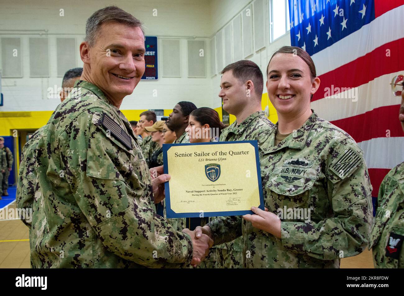 NAVAL SUPPORT ACTIVITY SOUDA BAY, Greece (Nov. 10, 2022) Capt. Odin Klug, commanding officer, Naval Support Activity (NSA) Souda Bay, Greece, recognizes Logistics Specialist 1st Class Brianna Glynn as NSA Souda Bay’s Senior Sailor of the Quarter for the fourth quarter of Fiscal Year 2022 during an awards ceremony on Nov. 10, 2022. NSA Souda Bay is an operational ashore installation which enables and supports U.S., Allied, Coalition, and Partner nation forces to preserve security and stability in the European, African, and Central Command areas of responsibility. Stock Photo