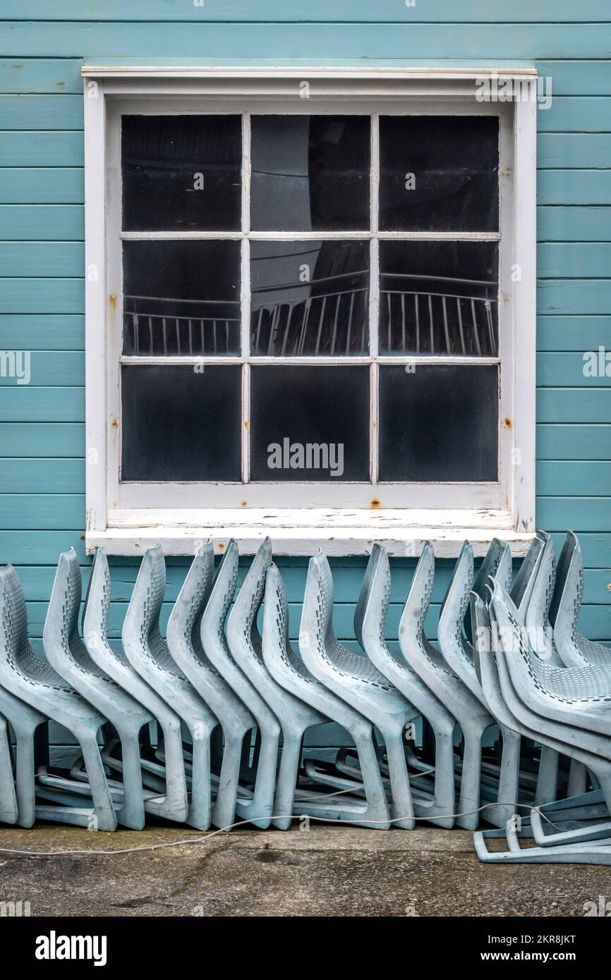Chairs stored at rear of building, Wellington, North island, New