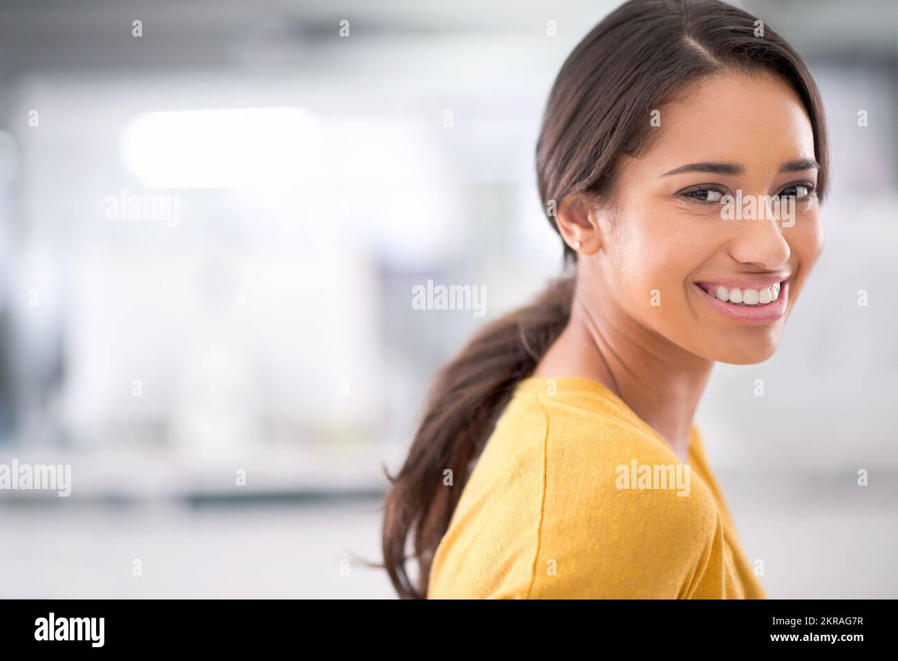 Shes got the right attitude. Cropped portrait of an attractive young businesswoman in the office. Stock Photo