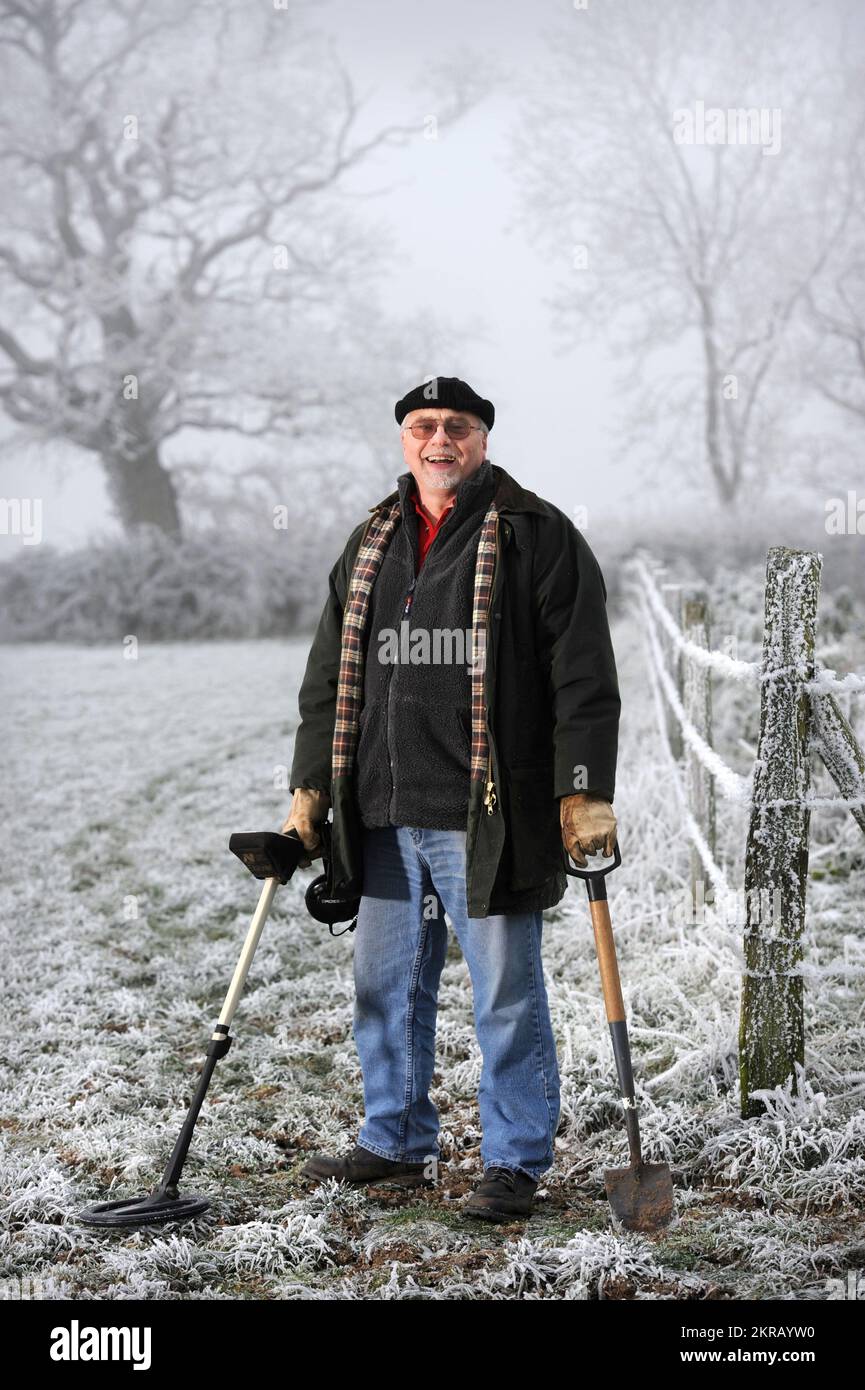 Metal detector David Crisp in the Somerset field where he discovered the 'Frome Hoard', the second largest collection of Roman coins to be unearthed Stock Photo