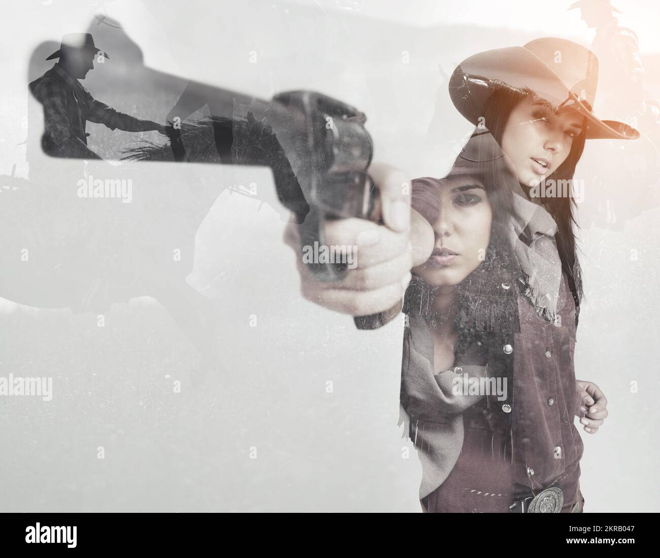 Call me maam one more time. Multiple exposure portrait of a cowgirl aiming her pistol superimposed over a western background. Stock Photo