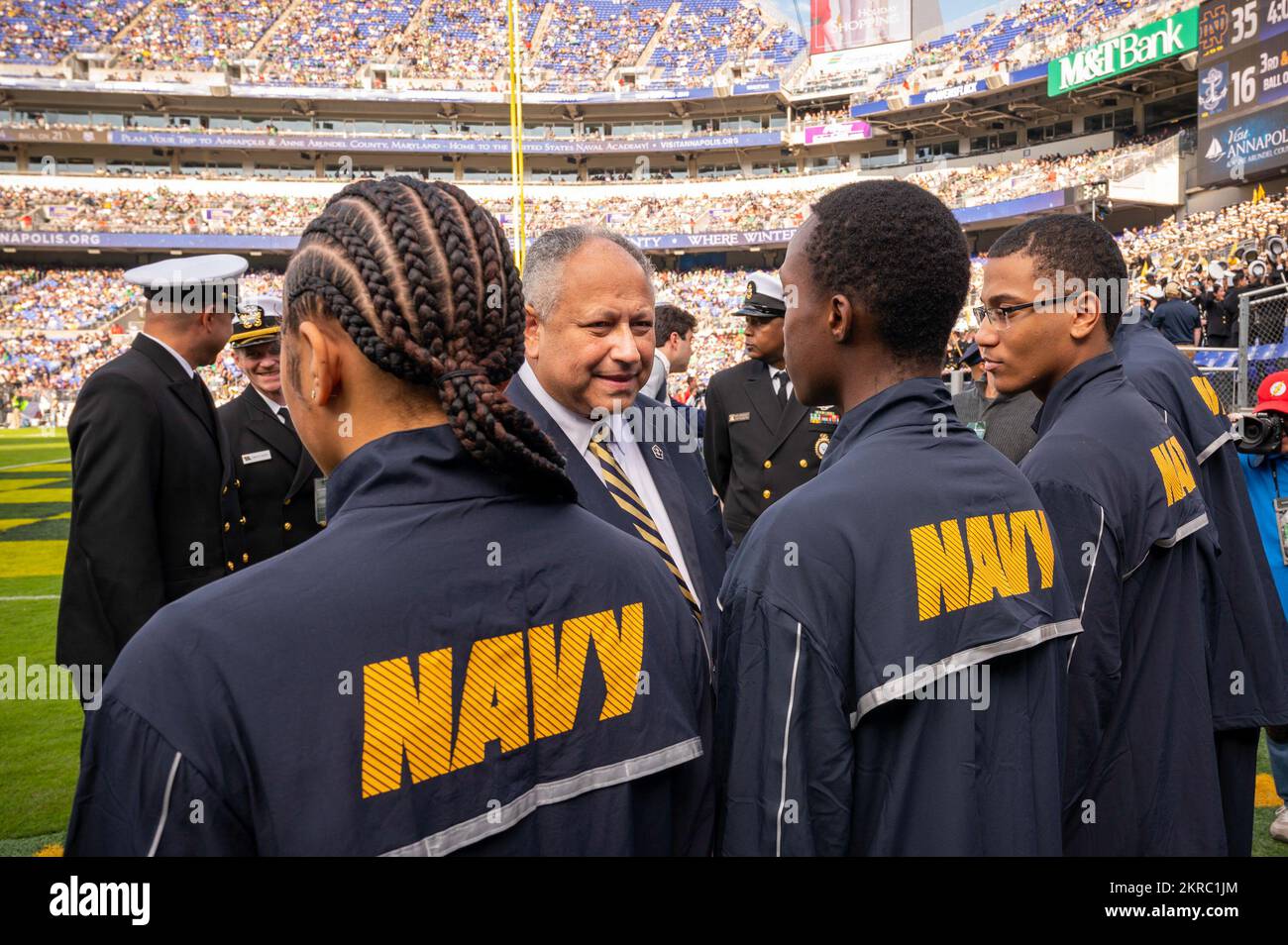 221112-N-WF272-2483 BALTIMORE (Nov. 12, 2022) U.S. Secretary of the Navy Carlos Del Toro meets future U.S. Navy Sailors, recruited by Navy Talent Acquisition Group Philadelphia, during the Navy-Notre Dame football game held at M&T Bank Stadium in Baltimore, Nov. 12, 2022. The game marked the 23rd time the city of Baltimore has hosted a Navy-Notre Dame game and the first since 2008. NTAG Philadelphia encompasses regions of Pennsylvania, New Jersey, Delaware, Maryland and West Virginia, providing recruiting services from more than 30 talent acquisition sites with the overall goal of attracting t Stock Photo