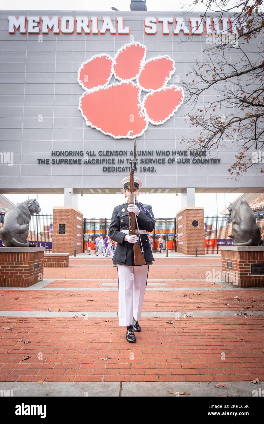 Clemson University Army ROTC cadet Laura McCurry, a senior from Rome, Georgia studying criminal justice and member of the Pershing Rifles honor guard, posts sentinel at the Scroll of Honor before the Clemson Tigers’ Military Appreciation Game, Nov. 12, 2022. The Pershing Rifles guard the Scroll of Honor, which displays the names of all 497 Clemson alumni who have given the ultimate sacrifice, for 24 hours before each year's Military Appreciation Game. (Photo by Ken Scar) Stock Photo