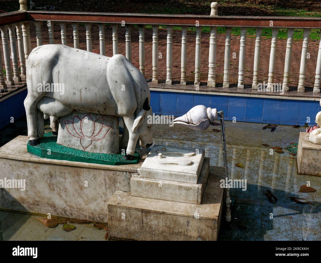 Hindu religious symbol Cow and Lotus and Shell carved in marble in Goa ...