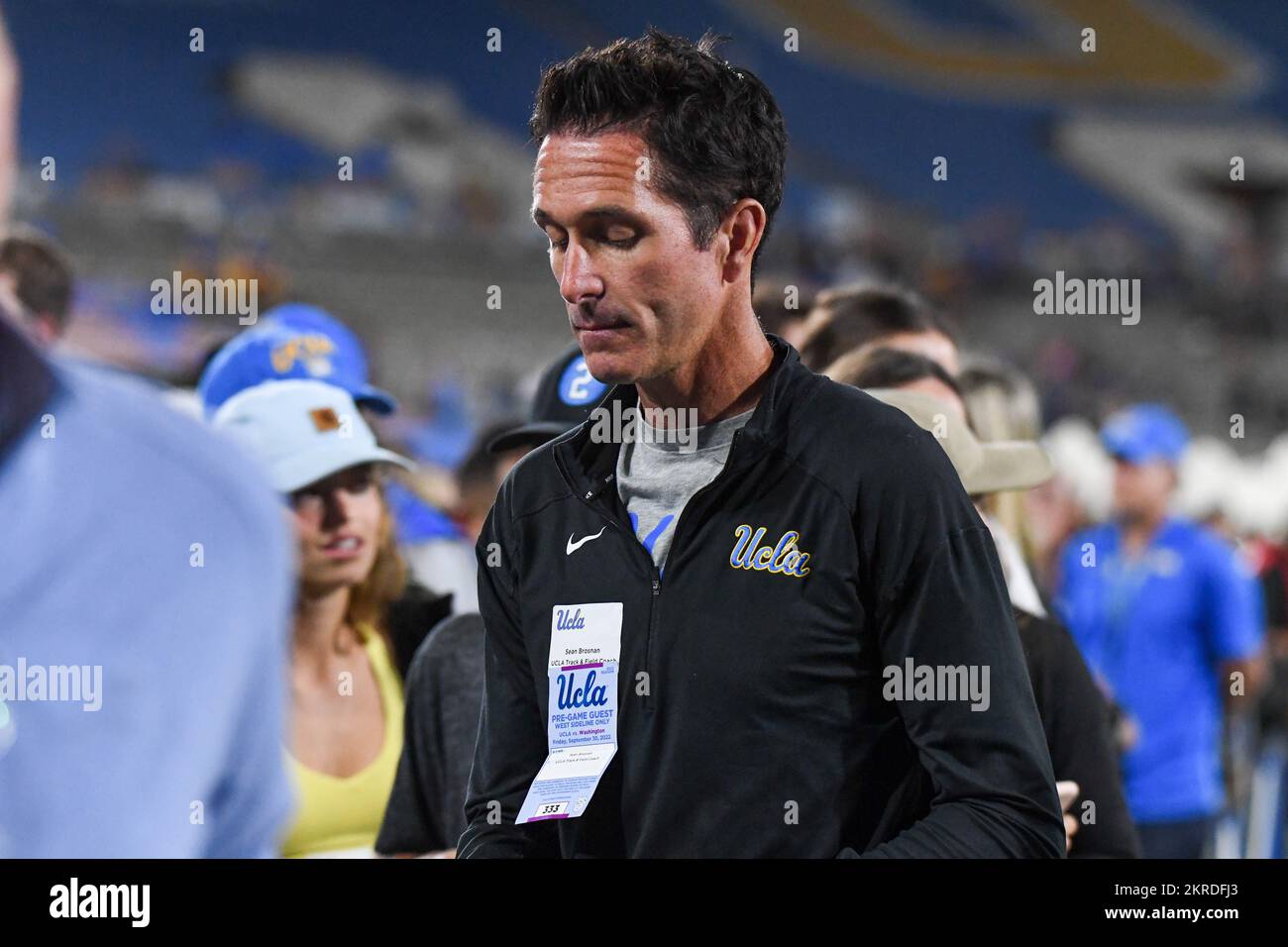 UCLA Cross Country coach Sean Brosnan on the sidelines during an NCAA football game between the UCLA Bruins and the Washington Huskies, Friday, Sep. 3 Stock Photo