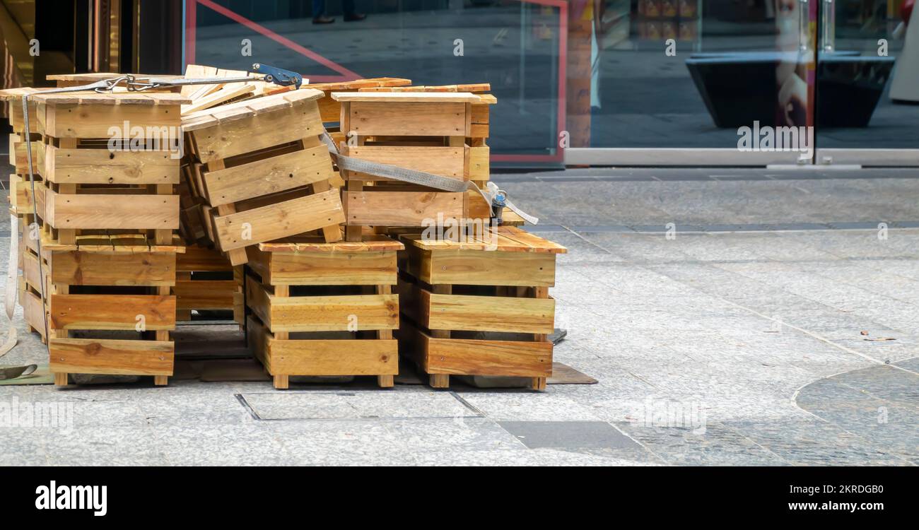 A pile of timber packing boxes left in a city street in an Australian city Stock Photo Alamy
