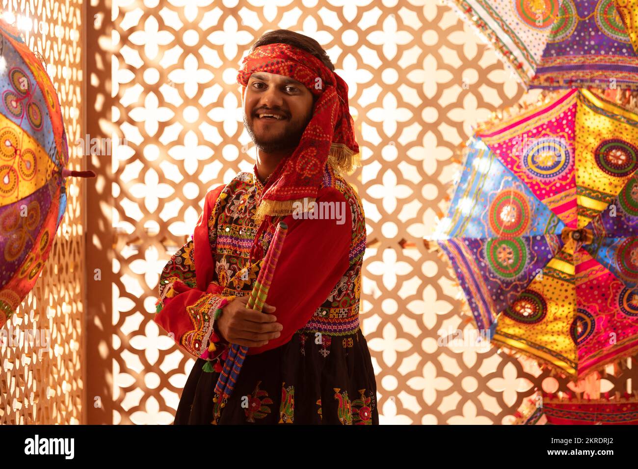 Portrait of Gujrati man with dandiya sticks Stock Photo - Alamy