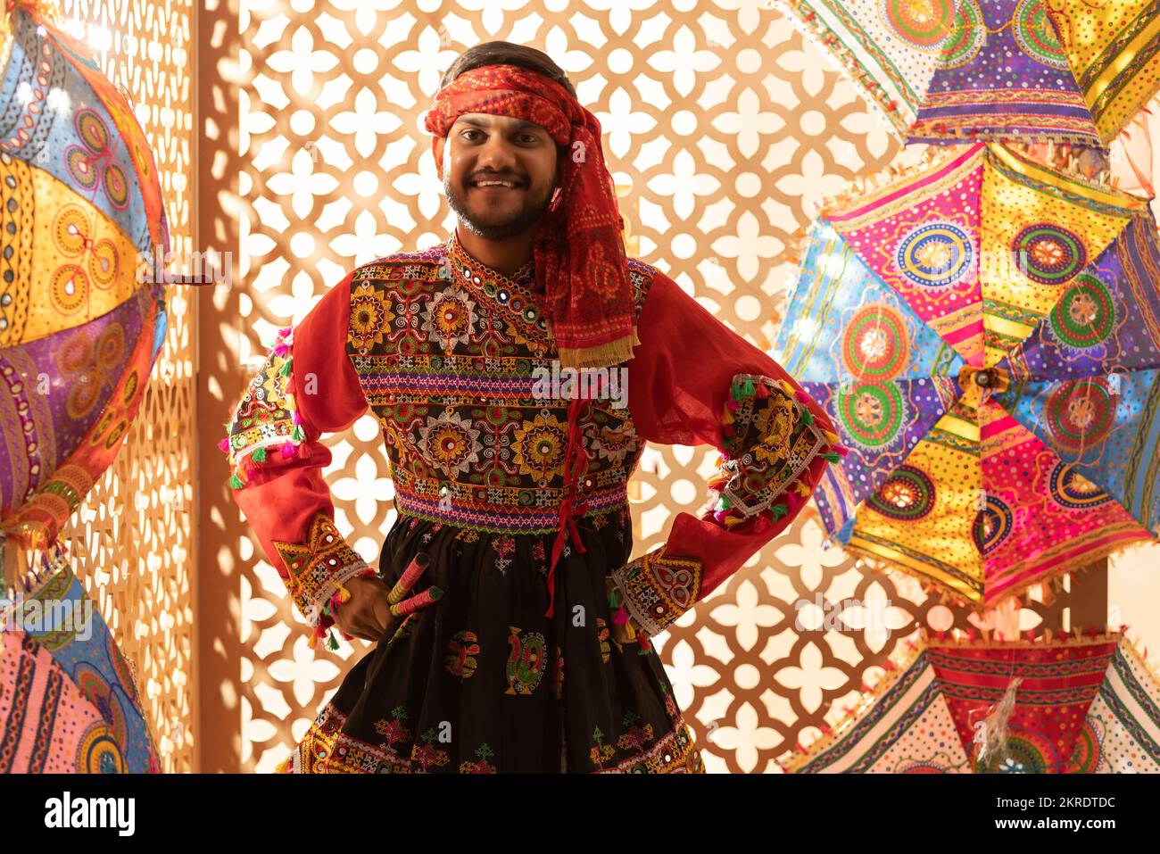 Portrait of Gujrati man with dandiya sticks Stock Photo - Alamy
