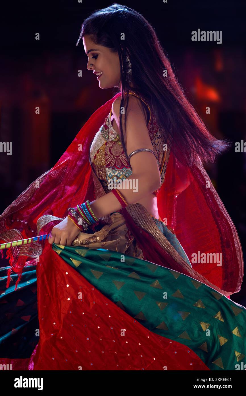 Gujrati woman performing Garba on stage Stock Photo