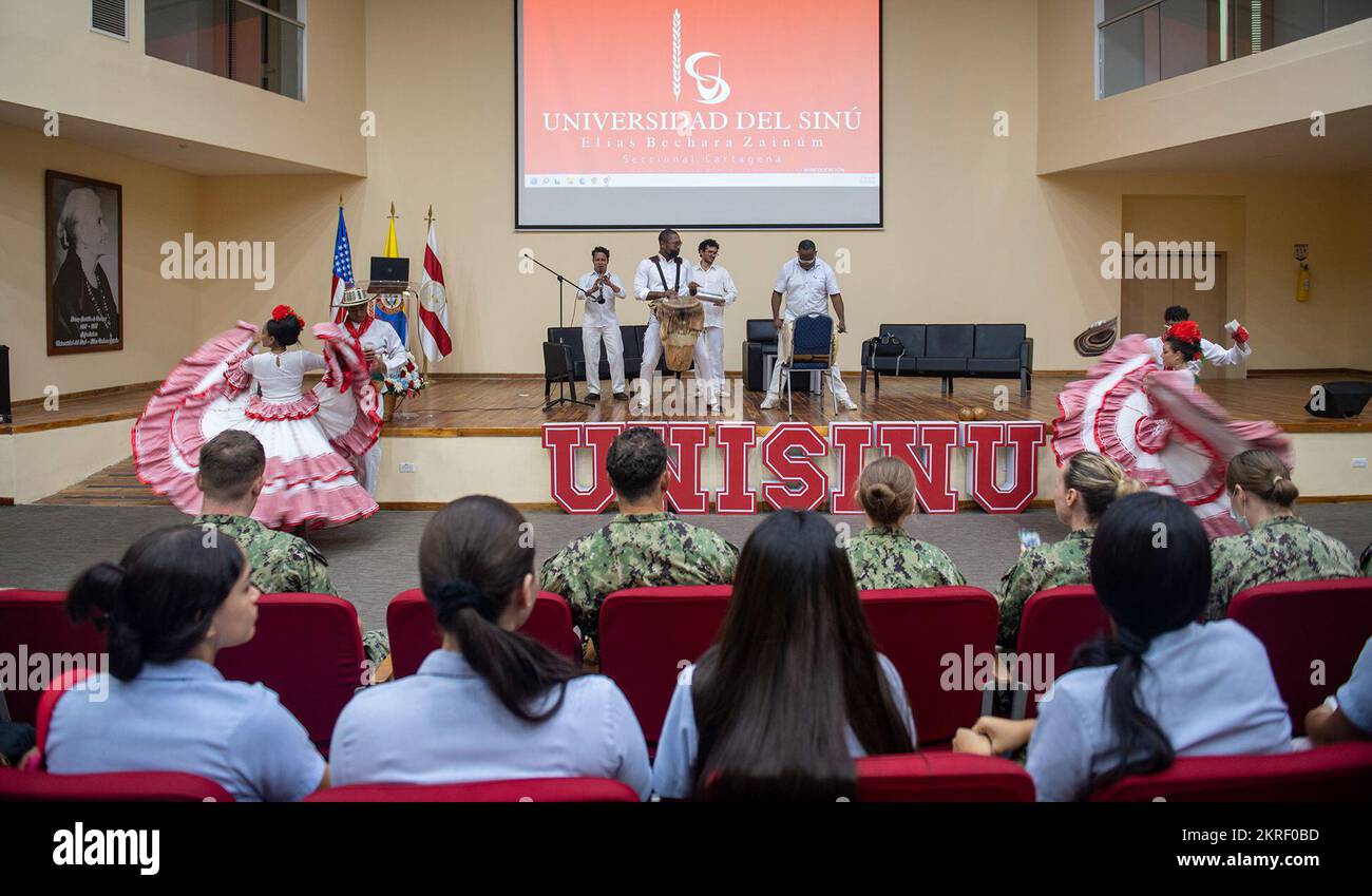 221115-N-DF135-1038 CARTAGENA, Colombia (Nov. 15, 2022) – Students from the Universidad del Sinú perform the tradition dance of Cumbia for the medical members of the hospital ship USNS Comfort (T-AH 20) in Cartagena, Colombia on Nov. 15, 2022. Comfort is deployed to U.S. 4th Fleet in support of Continuing Promise 2022, a humanitarian assistance and goodwill mission conducting direct medical care, expeditionary veterinary care, and subject matter expert exchanges with five partner nations in the Caribbean, Central and South America. Stock Photo
