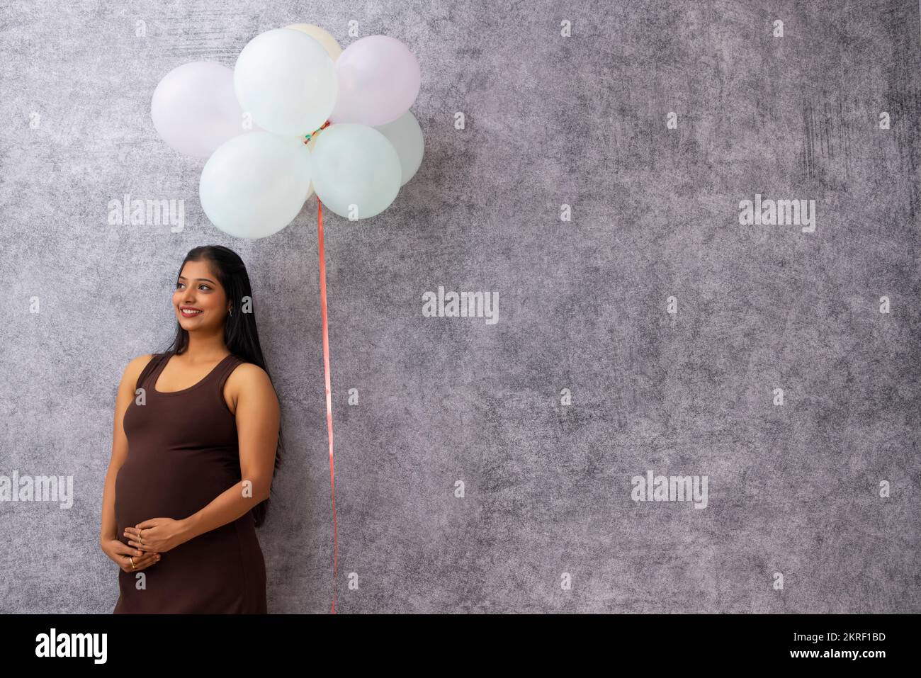 Happy indian pregnant woman hi-res stock photography and images - Alamy