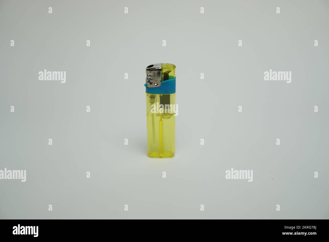yellow lighter on a white background Stock Photo Alamy
