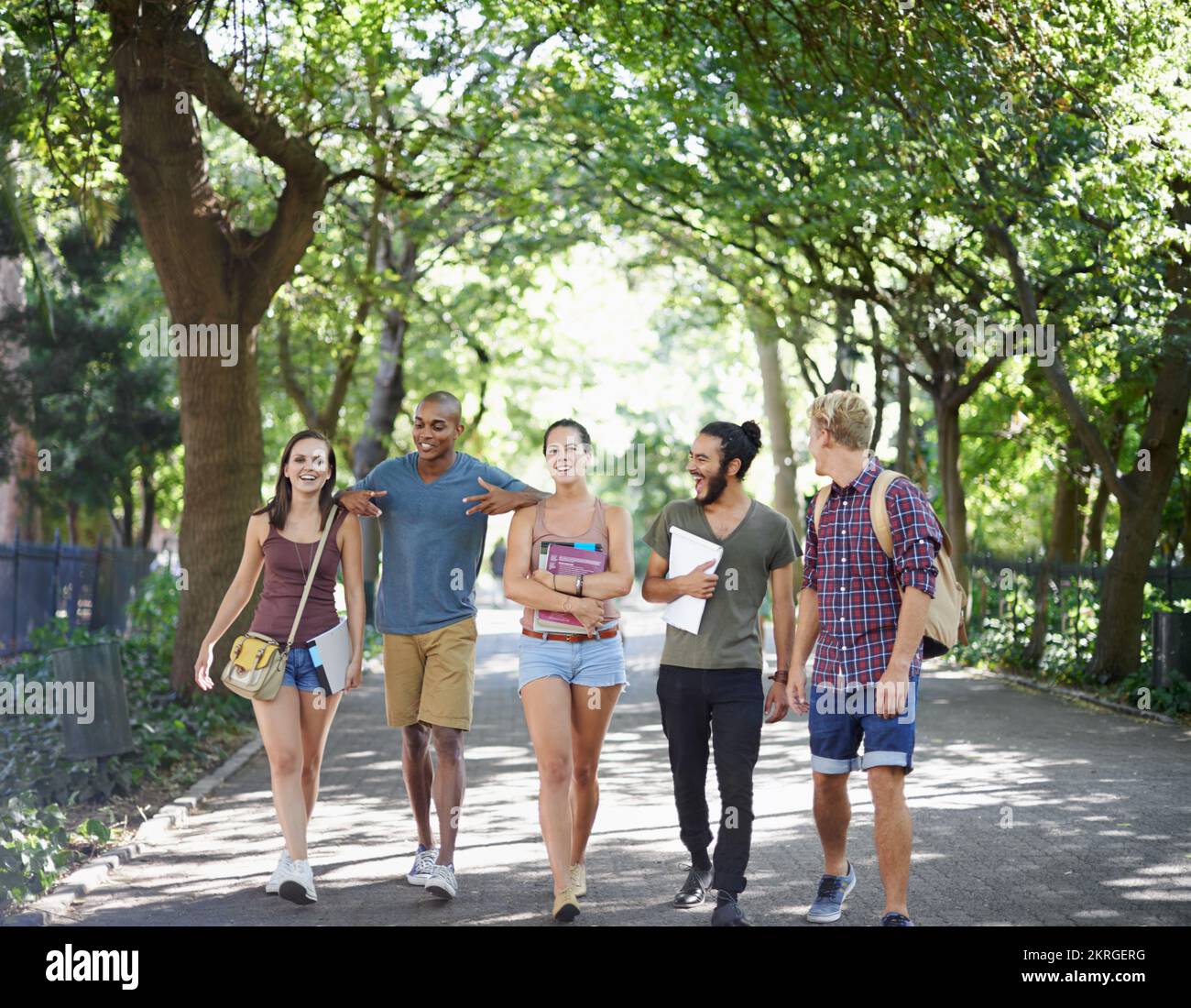 A beautiful day to be on campus. college students hanging out on campus ...