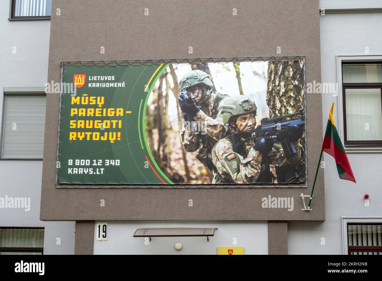 KAUNAS - JULY 09: Public service announcement or social advertisement about Lithuanian Armed Forces on facade of a building  in Kaunas on July 09. 202 Stock Photo