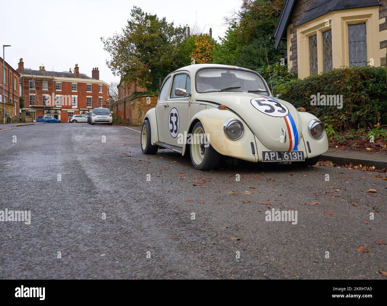 Iconic Volkswagen Beetle movie car replica parked on a road in Ashby de