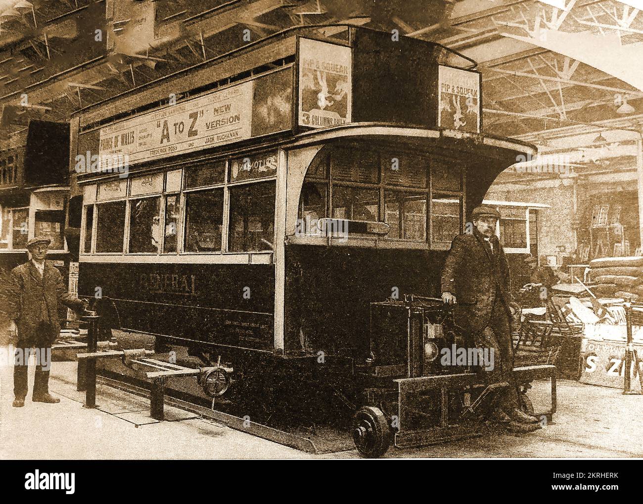 A 1930's British London open topped double-decker omnibus in the depot for repair and refurbishment.. Stock Photo