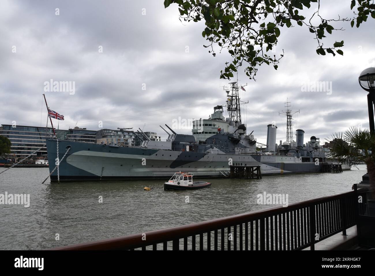 View on HMS Belfast, a famous WWII battleship, moored on the River Thames. Stock Photo