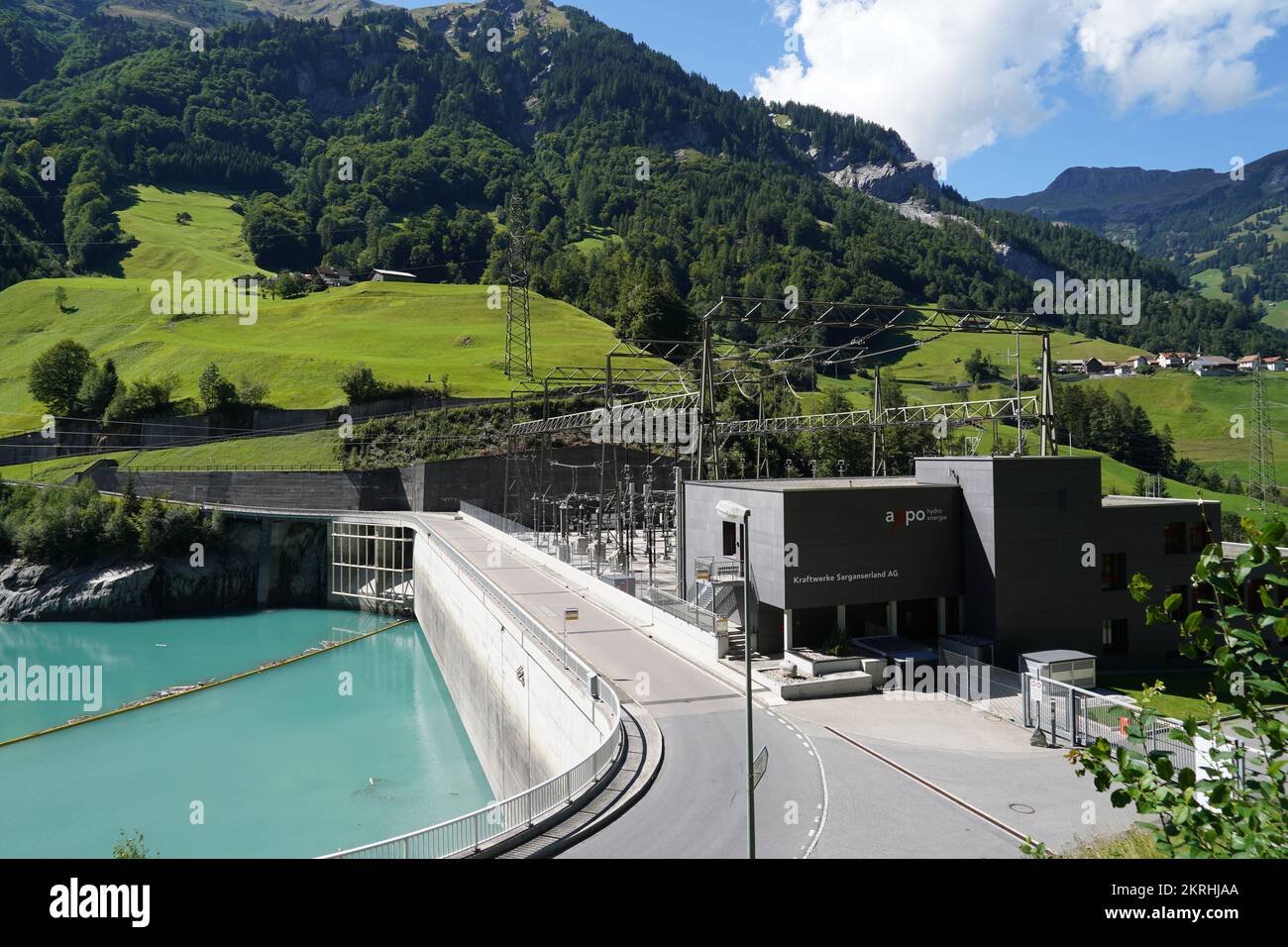 Hydroelectric power plant with three turbines on reservoir Mapraggsee. Stock Photo