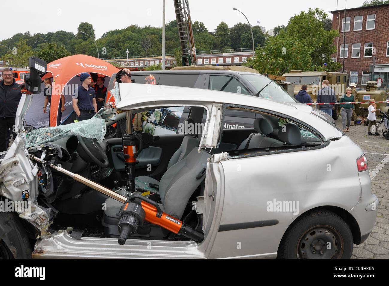 Open day demonstration of emergency rescuing people from damaged cars during traffic accidents. Stock Photo
