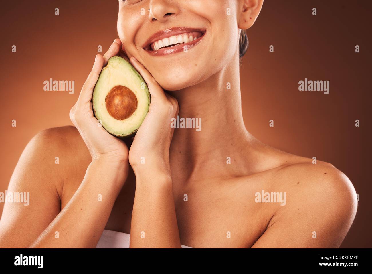 Health, avocado and happy skincare woman with satisfied smile for aesthetic, beauty and youth. Happiness, body care and natural cosmetic lifestyle Stock Photo