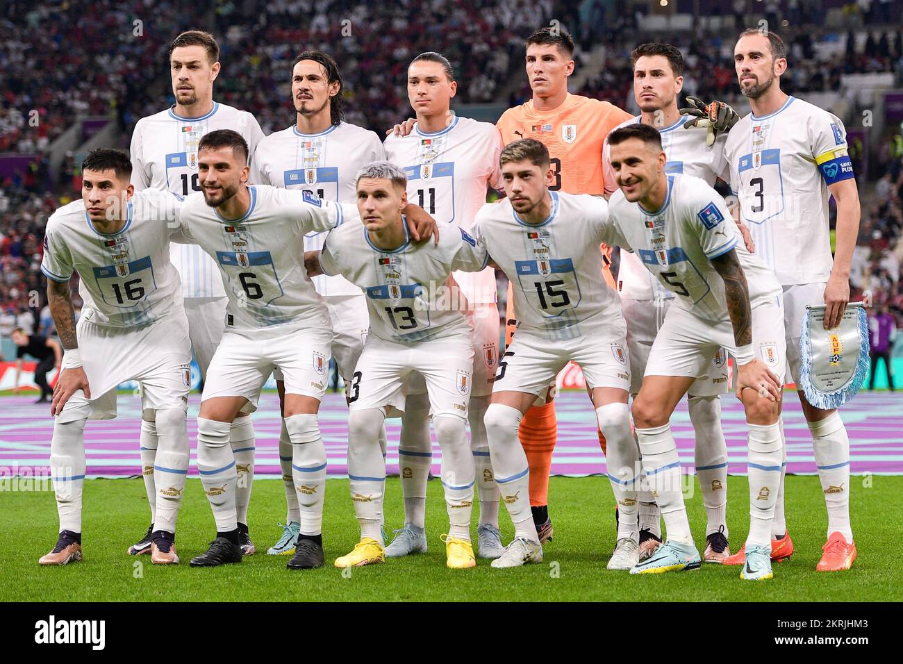 LUSAIL CITY, QATAR - NOVEMBER 28: Teamphoto of Uruguay with Sergio Rochet of Uruguay, Jose Gimenez of Uruguay, Diego Godin of Uruguay, Guillermo Varela of Uruguay, Mathias Oliveira of Uruguay, Sebastian Coates of Uruguay, Mathias Vecino of Uruguay, Rodrigo Bentancur of Uruguay, Federico Valverde of Uruguay, Darwin Nunez of Uruguay and Edinson Cavani of Uruguay prior to the Group H - FIFA World Cup Qatar 2022 match between Portugal and Uruguay at the Lusail Stadium on November 28, 2022 in Lusail City, Qatar (Photo by Pablo Morano/BSR Agency) Stock Photo