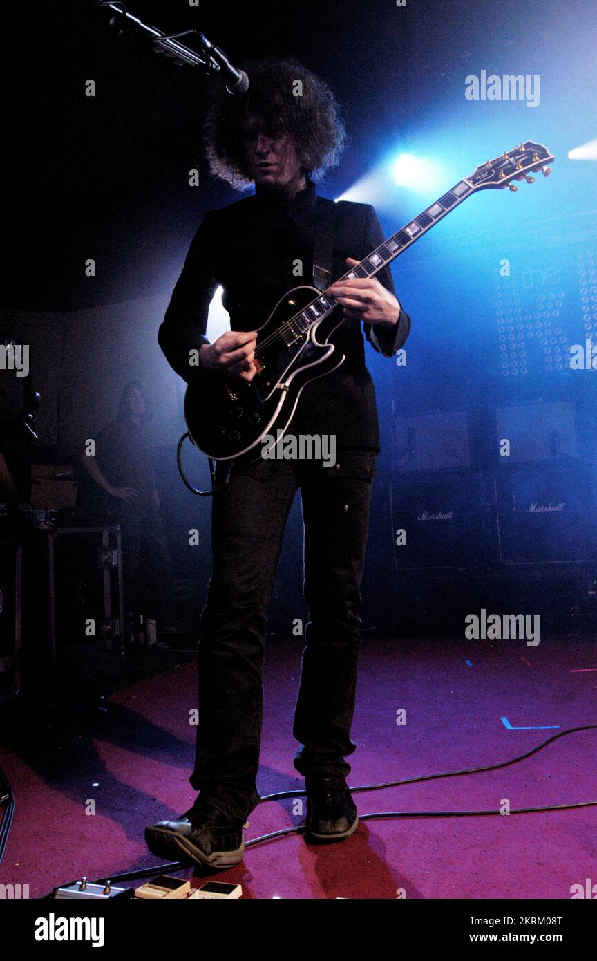 THE KILLERS, YOUNG, HOT FUSS TOUR, 2005: Ronnie Vannucci, guitarist of The Killers, on the NME Tour at Cardiff University, February 6 2005. Photograph: ROB WATKINS.   INFO: The Killers are an American rock band formed in Las Vegas in 2001. Known for their energetic sound and hits like 'Mr. Brightside,' they gained fame with their debut album 'Hot Fuss' and have remained influential in indie and alternative rock. Stock Photo