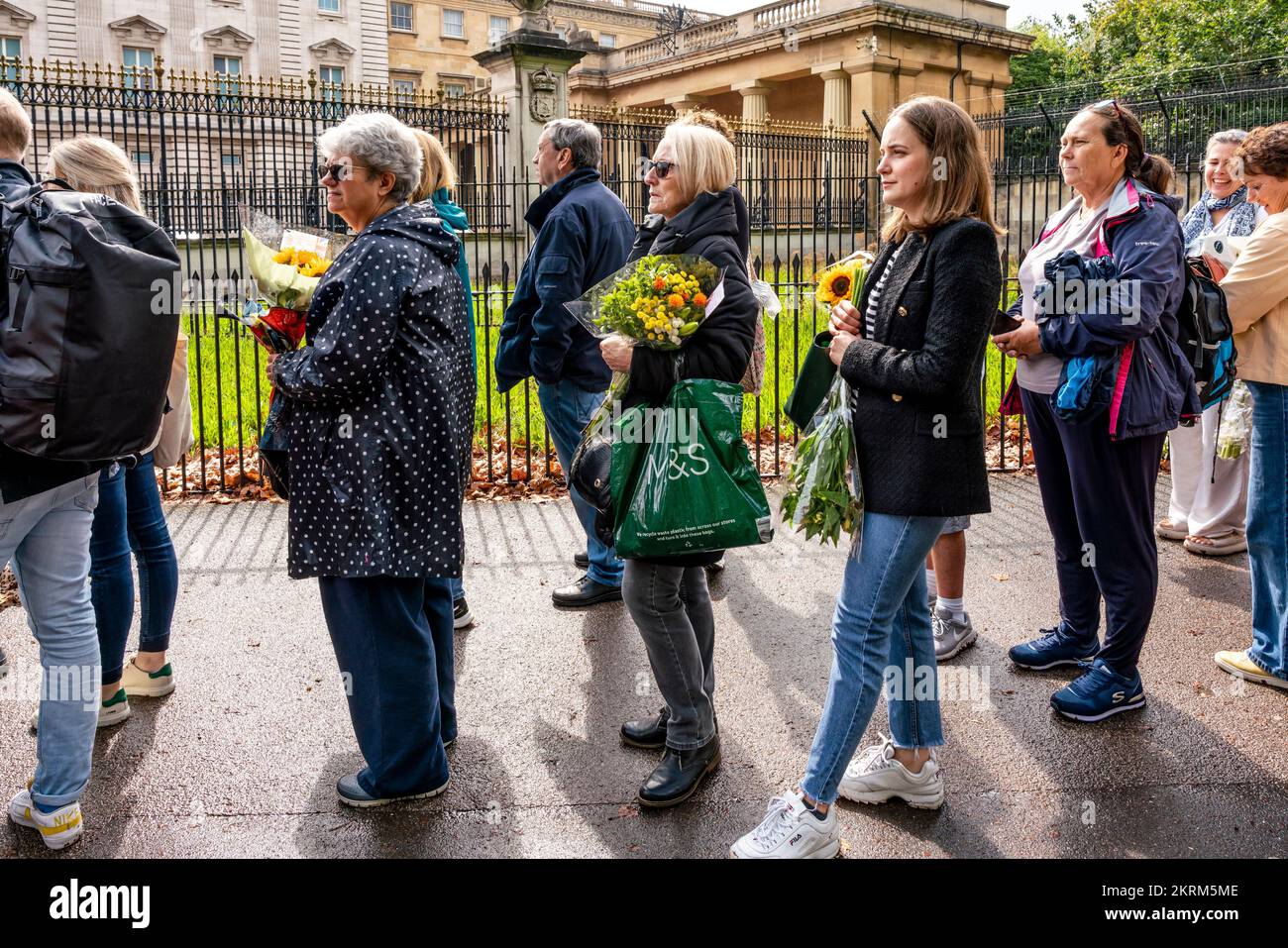 British People Gather Outside Buckingham Palace To Lay Flowers and Pay Their Respects After The