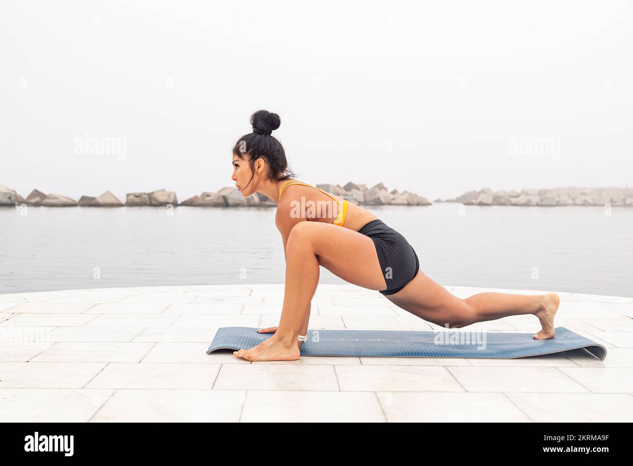 Side lunge yoga hi-res stock photography and images - Page 7 - Alamy
