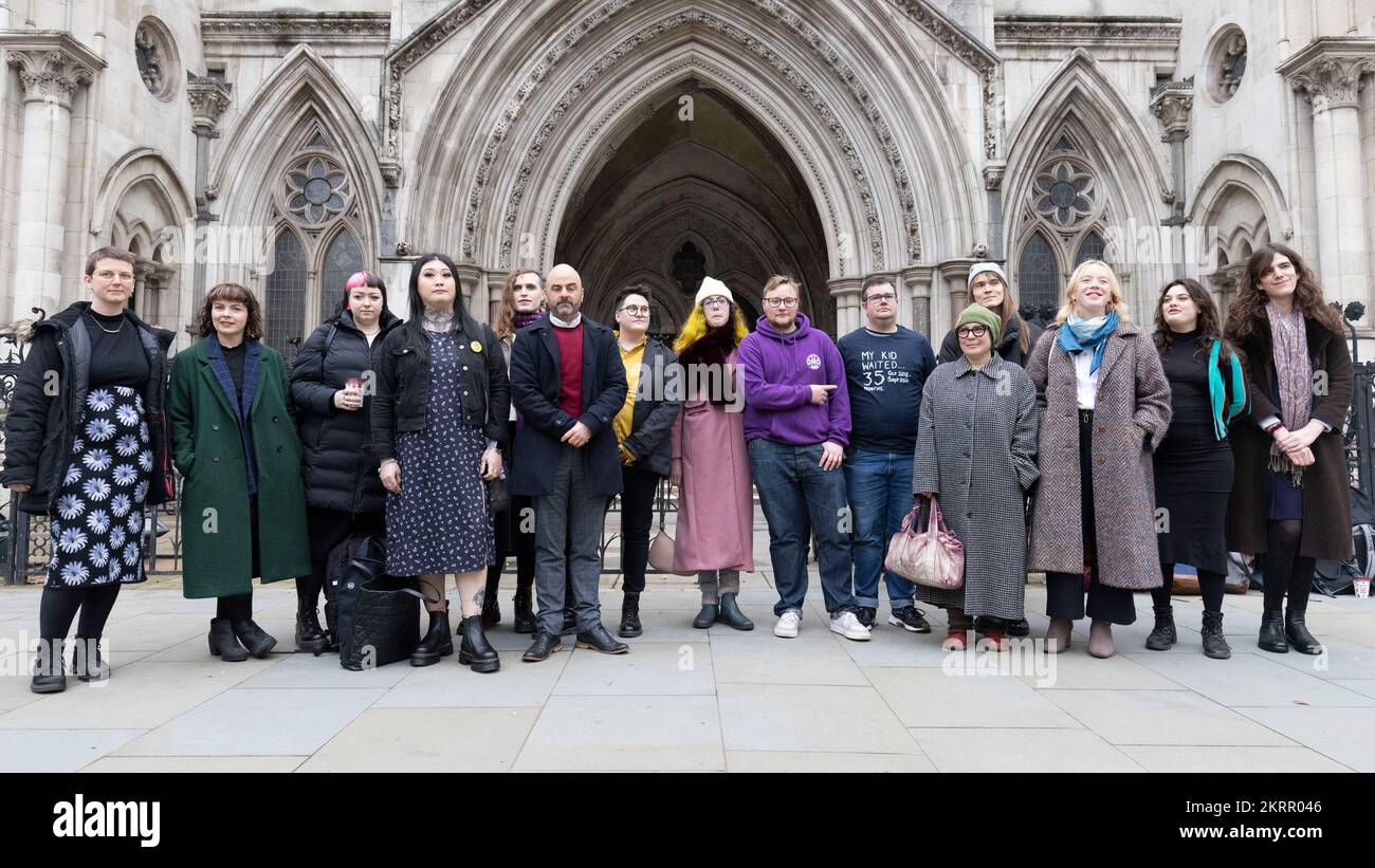 Trans youth group Gendered Intelligence outside the Royal Courts of Justice, London, where a High Court judge will hear a legal challenge brought by two children, two adults, trans charity Gendered Intelligence and the Good Law Project against the NHS Commissioning Board over access to healthcare for people with gender dysphoria. Picture date: Tuesday November 29, 2022. Stock Photo