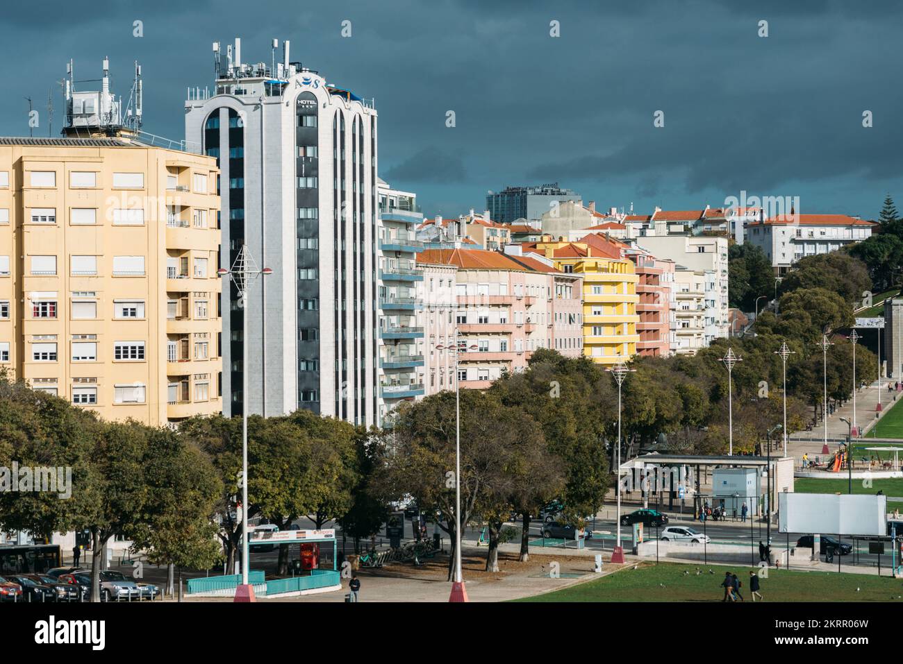 Large grass field at Alameda in Lisbon, Portugal with residential buildings Stock Photo