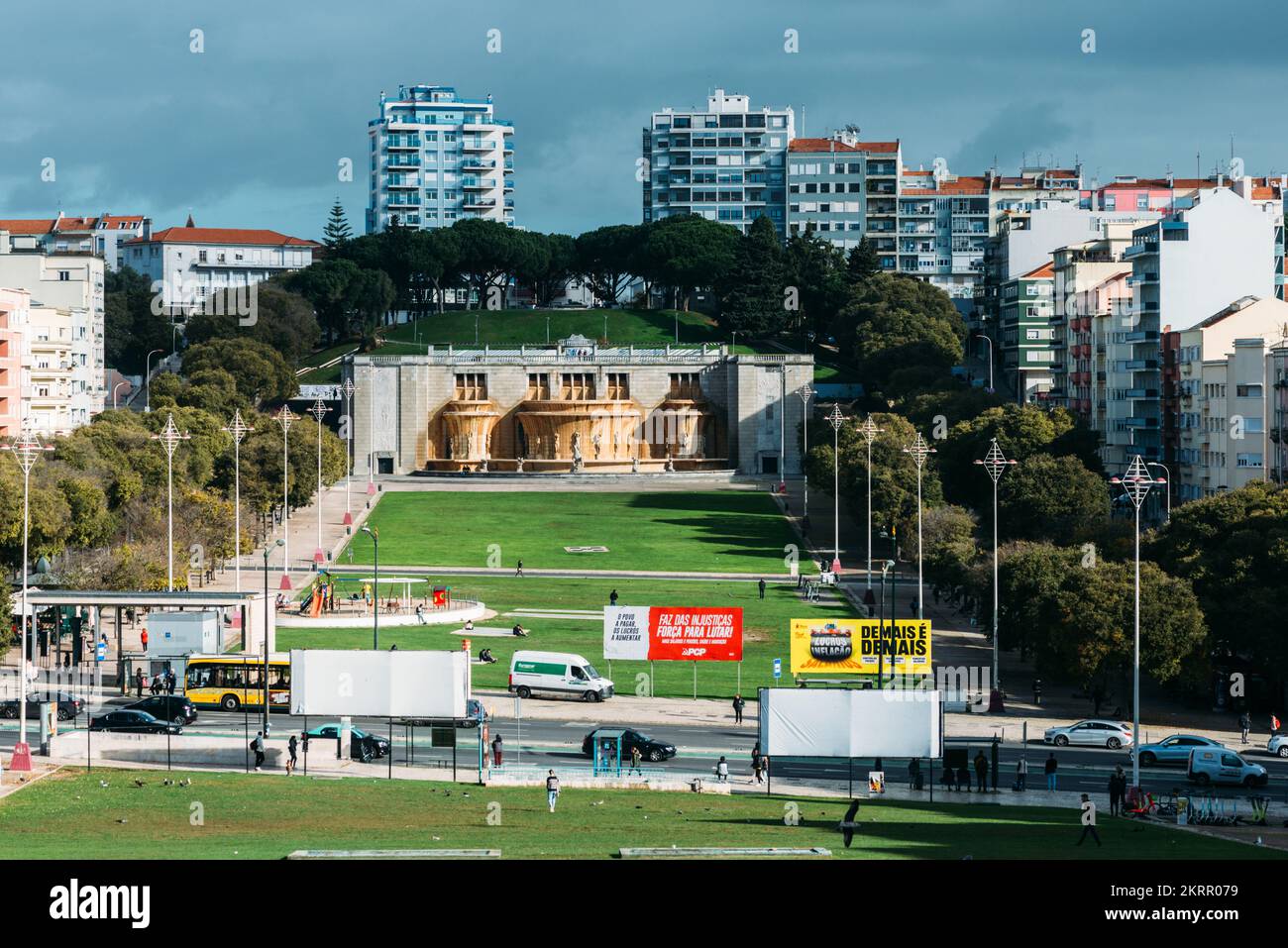 Large grass field at Alameda in Lisbon, Portugal with residential buildings Stock Photo
