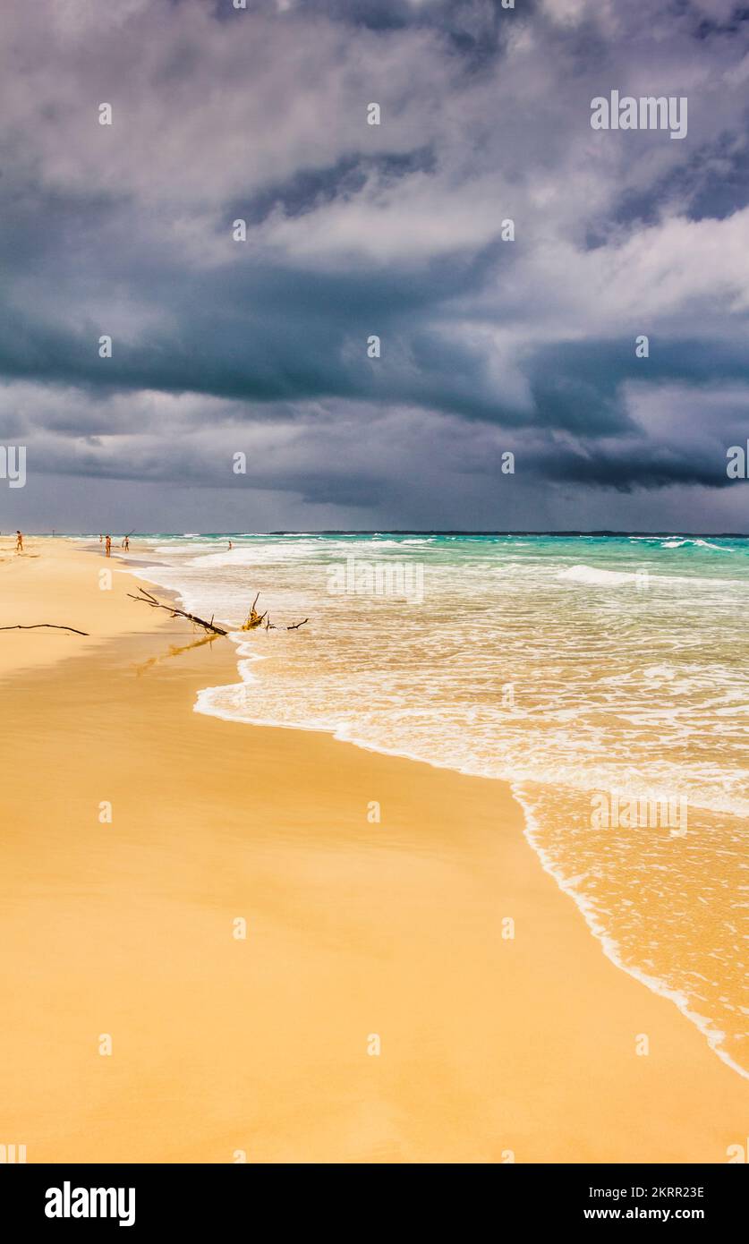 Calm and calamity in a contrasted scene of peaceful beaches meet severe storms. Flinders Beach, Amity, North Stradbroke Island, Queensland, Australia Stock Photo