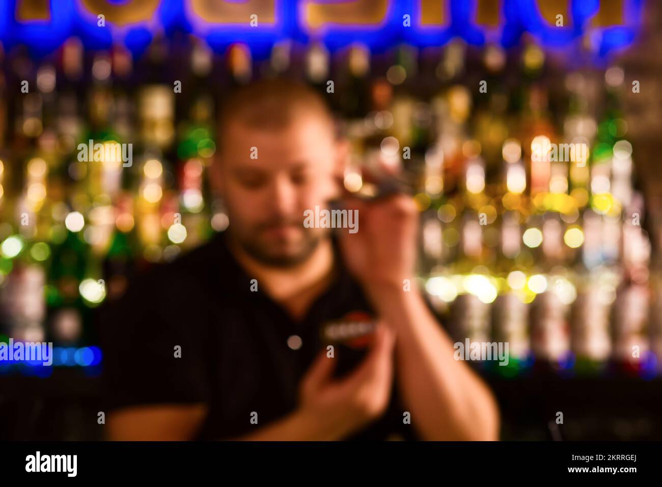 young man working as a bartender in a bar Stock Photo Alamy