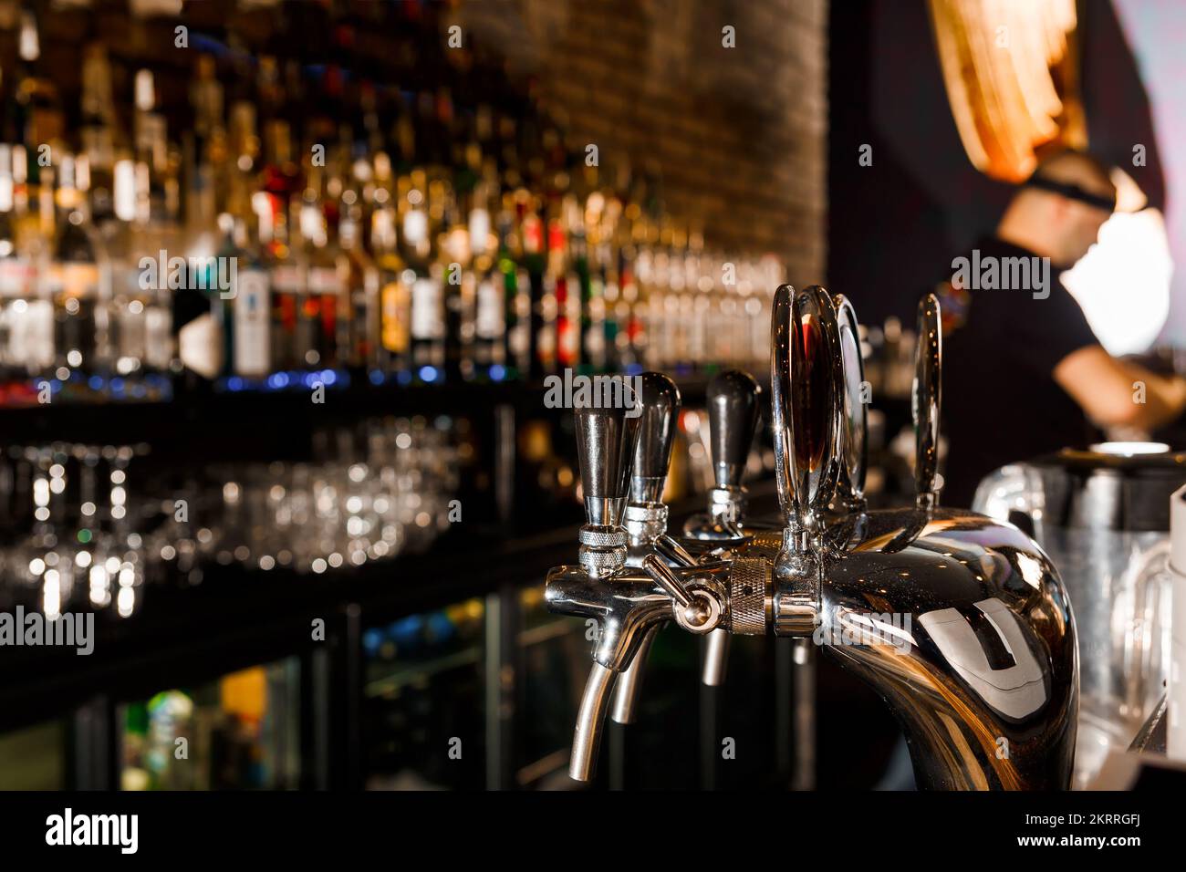 young man working as a bartender in a bar Stock Photo Alamy