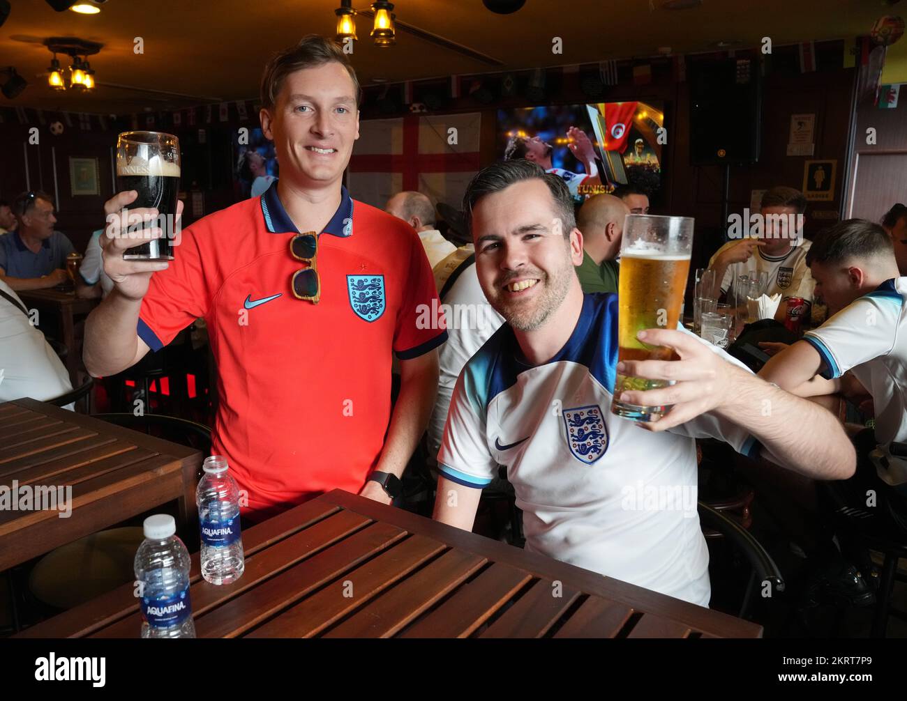 England fan James Vincent (left) and Mike Ritter gather at the Red Lion Pub & Restaurant in Doha, Qatar, on the day of the FIFA World Cup Group B match between Wales and England. Picture date: Tuesday November 29, 2022. Stock Photo