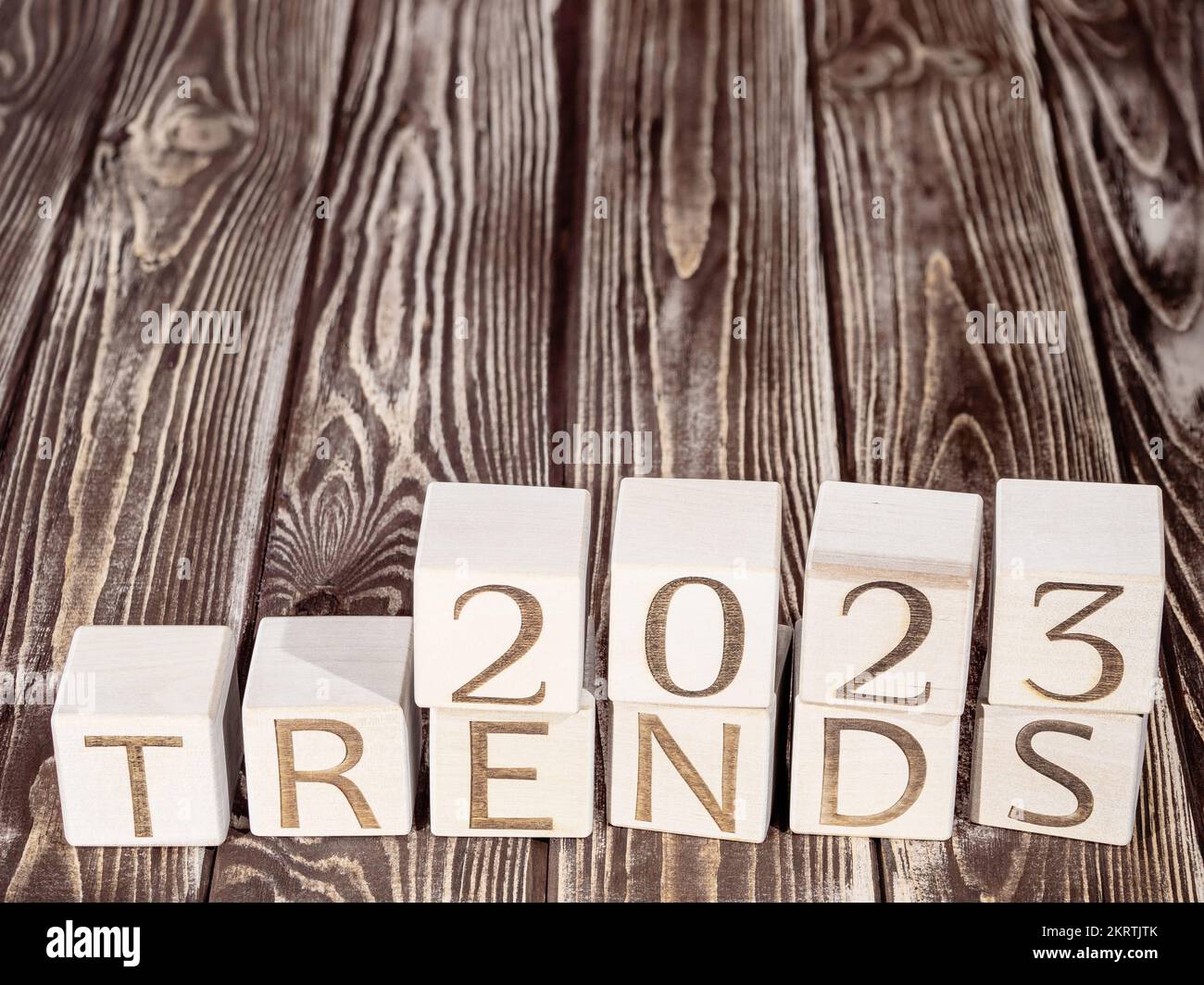 Text 2023 TRENDS on wooden cubes as a modern tendency concept Stock Photo