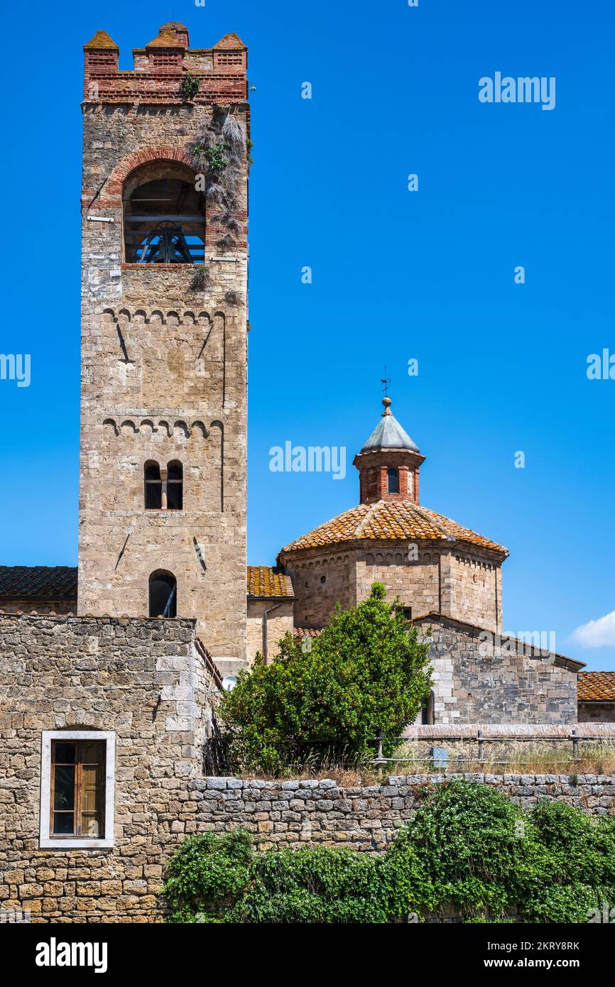Bell tower and capocroce of Basilica di Sant'Agata on Piazza della Basilica in Asciano in the Crete Senesi, Province of Siena, Tuscany, Italy Stock Photo