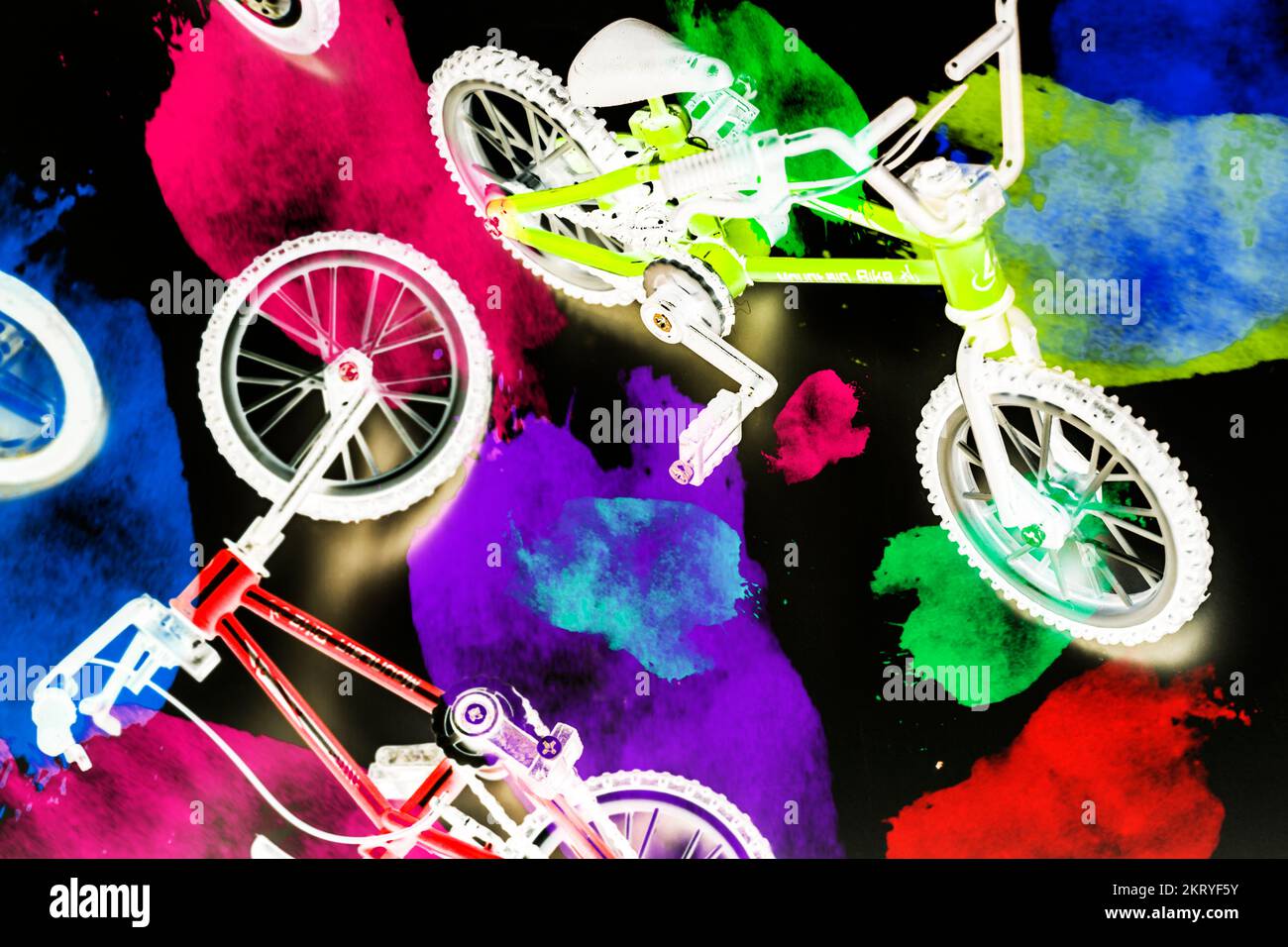 Dark urban design on a mix of colorful graffiti spray paint and bmx
