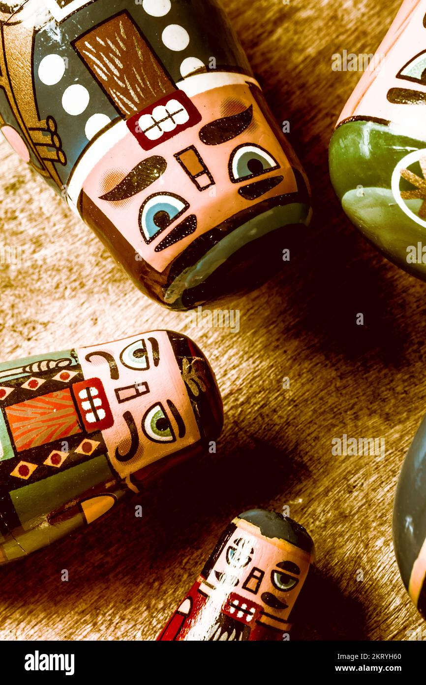 Weathered oldfashioned artwork on a circle of Russian nesting dolls on