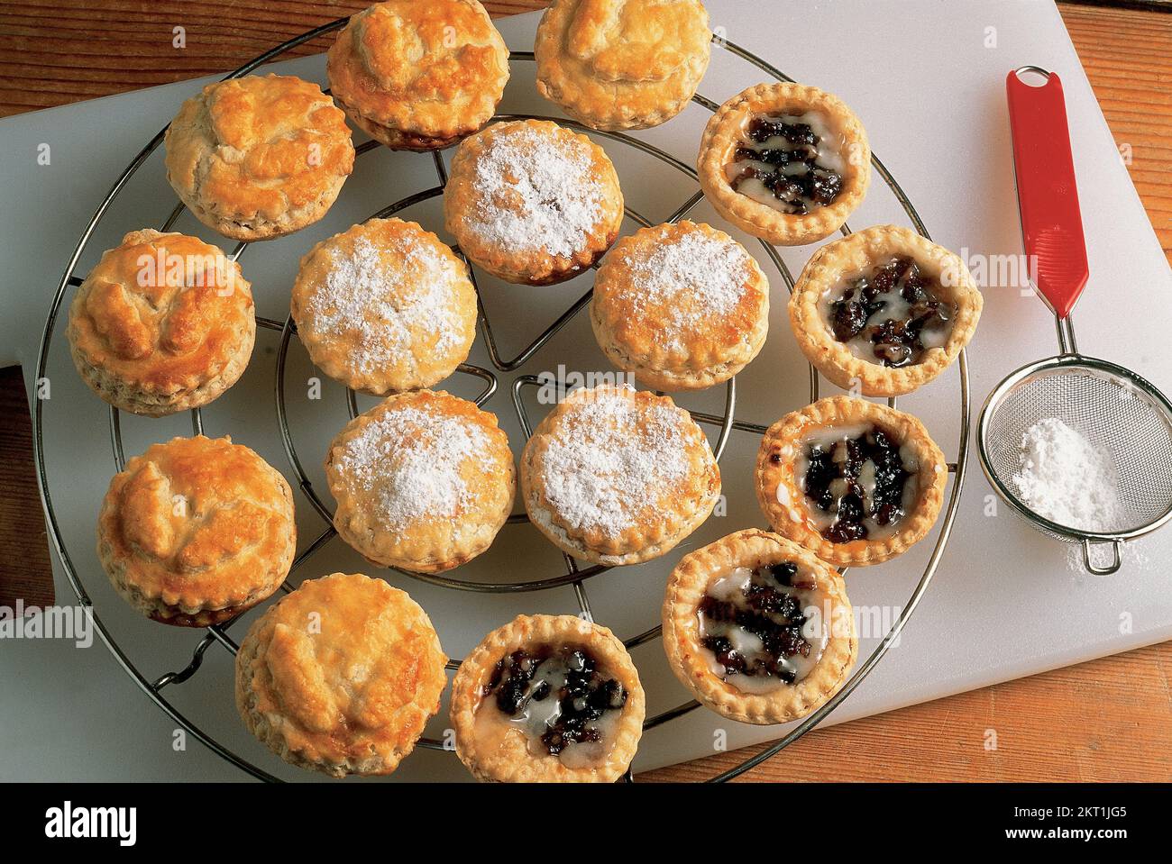 DoubleCrust Mince Pies on a wire rack Stock Photo Alamy