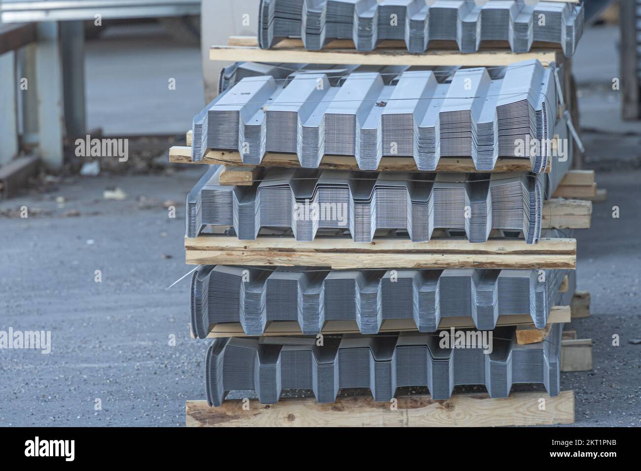 Pile of Metal roofing sheets to be picked up Stock Photo